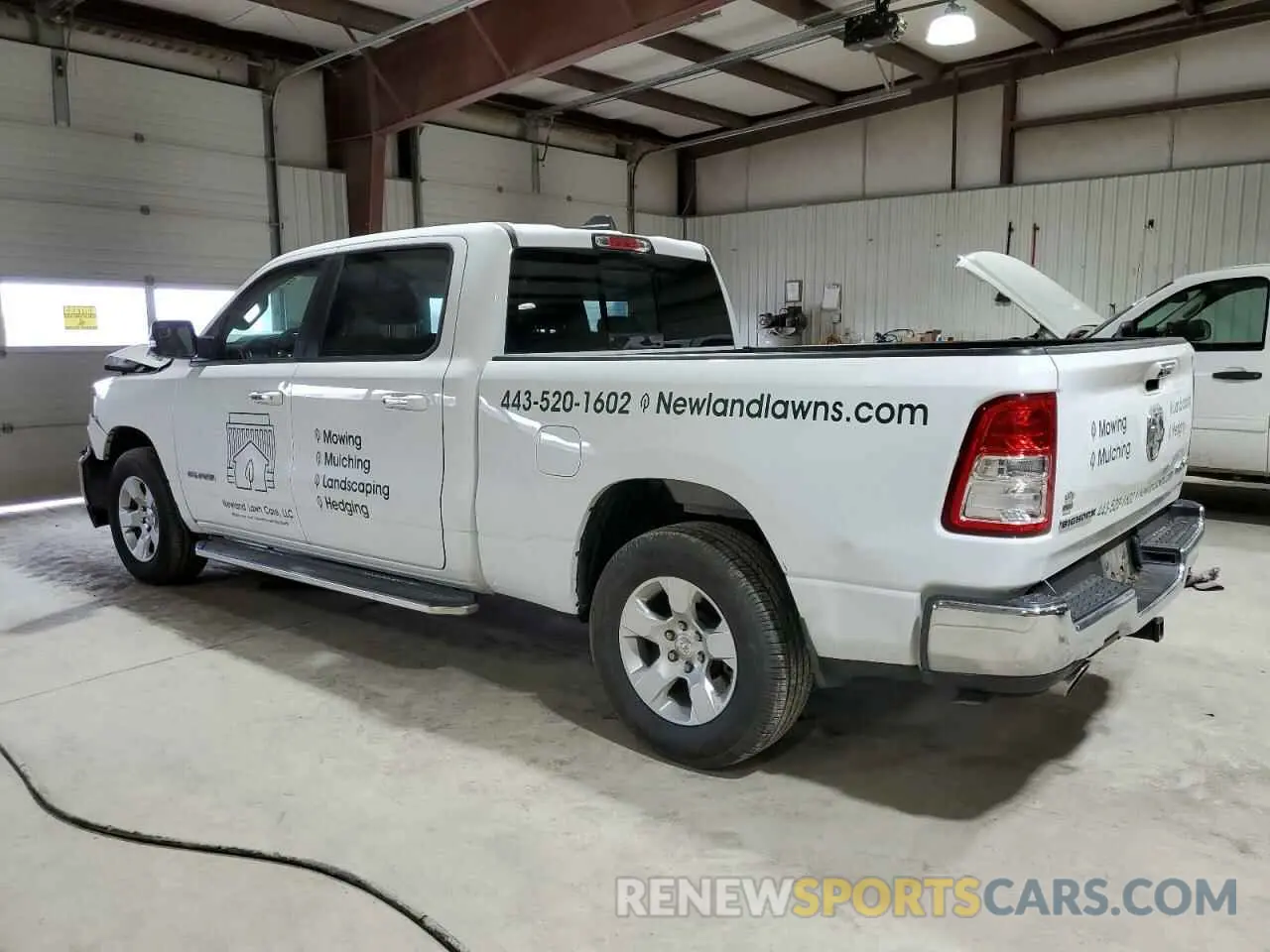 2 Photograph of a damaged car 1C6SRFMT6LN339656 RAM 1500 2020