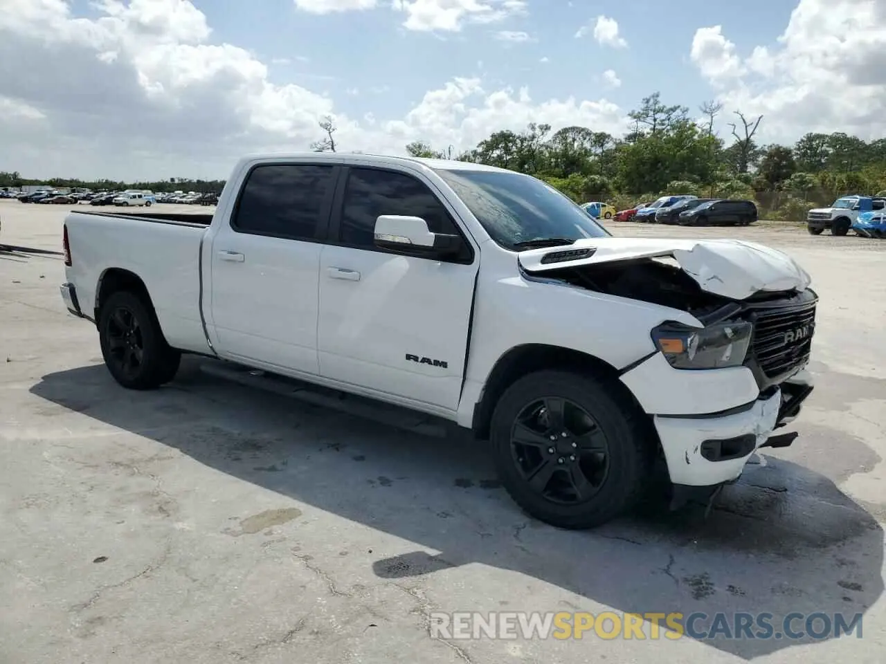 4 Photograph of a damaged car 1C6SRFMT8LN182860 RAM 1500 2020