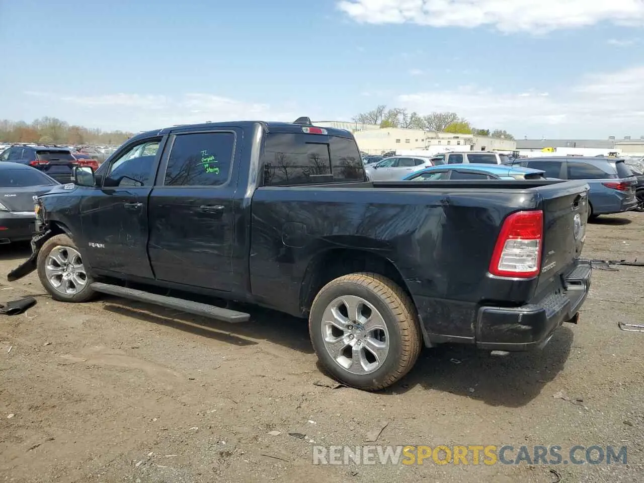 2 Photograph of a damaged car 1C6SRFMT8LN223701 RAM 1500 2020