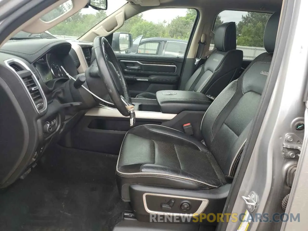 7 Photograph of a damaged car 1C6SRFRTXLN153613 RAM 1500 2020