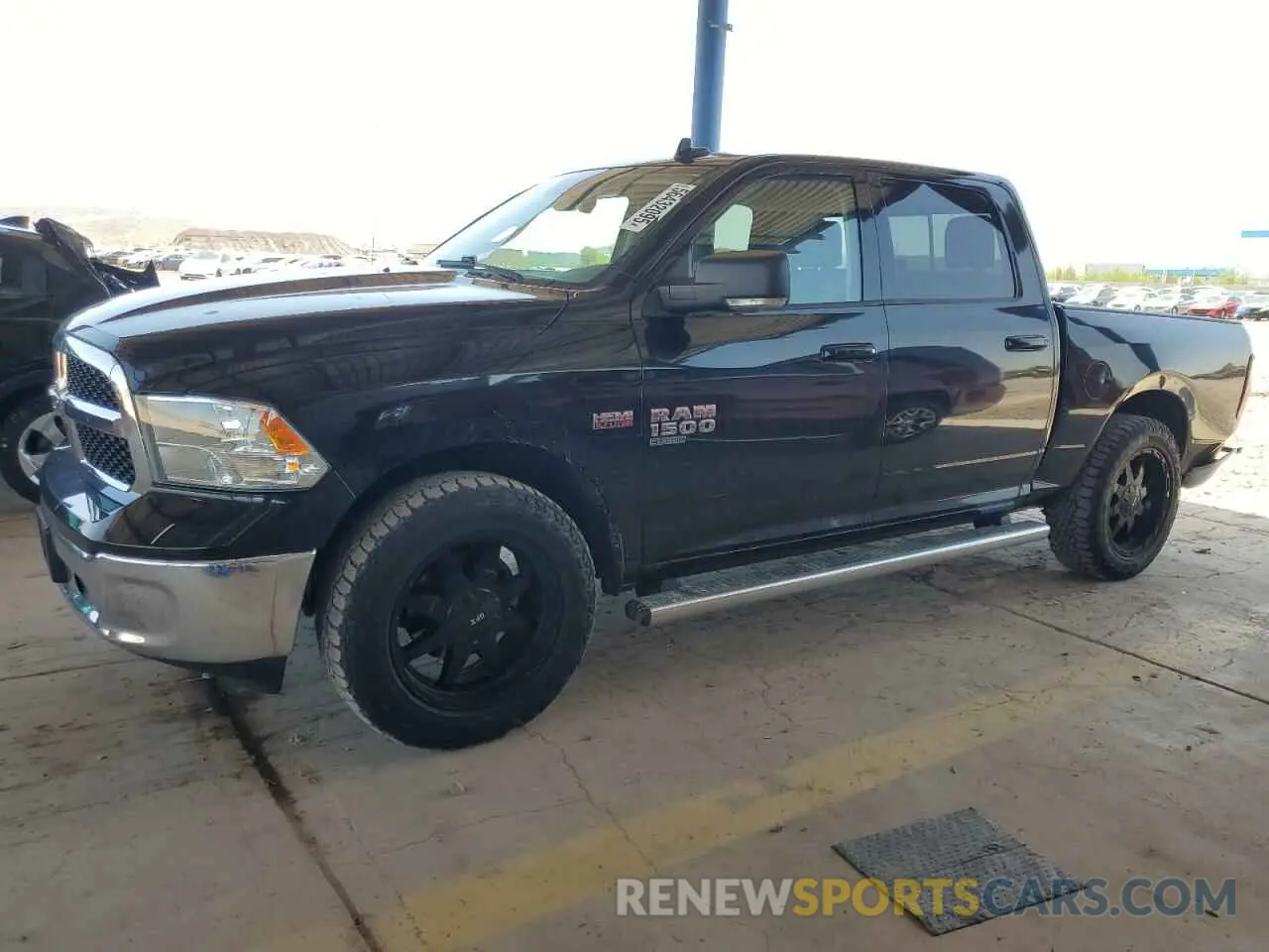 1 Photograph of a damaged car 3C6RR7LT8LG160873 RAM 1500 2020