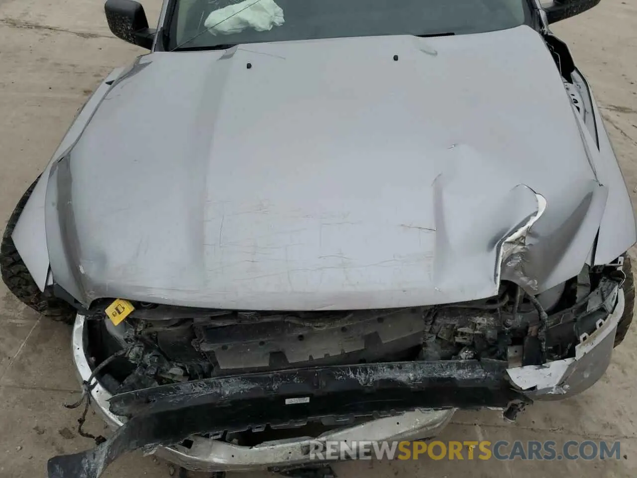 11 Photograph of a damaged car 1C6RR7FG5MS584780 RAM 1500 2021