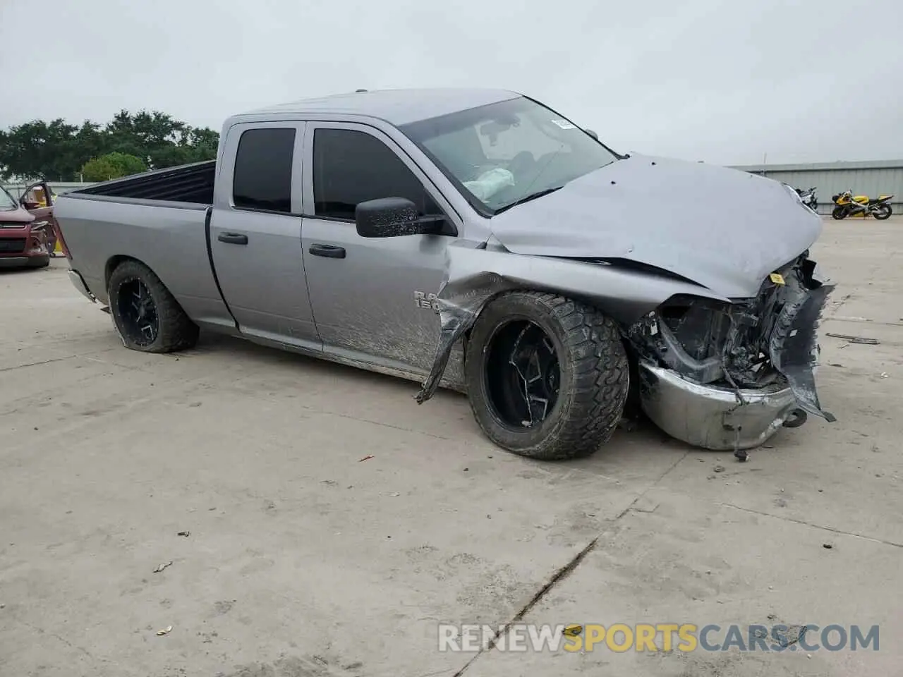 4 Photograph of a damaged car 1C6RR7FG5MS584780 RAM 1500 2021