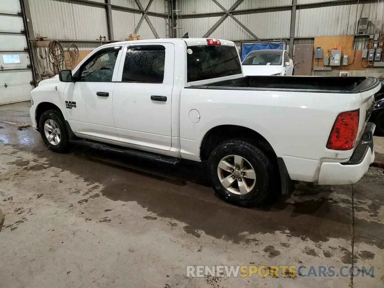 2 Photograph of a damaged car 1C6RR7KG2MS520296 RAM 1500 2021