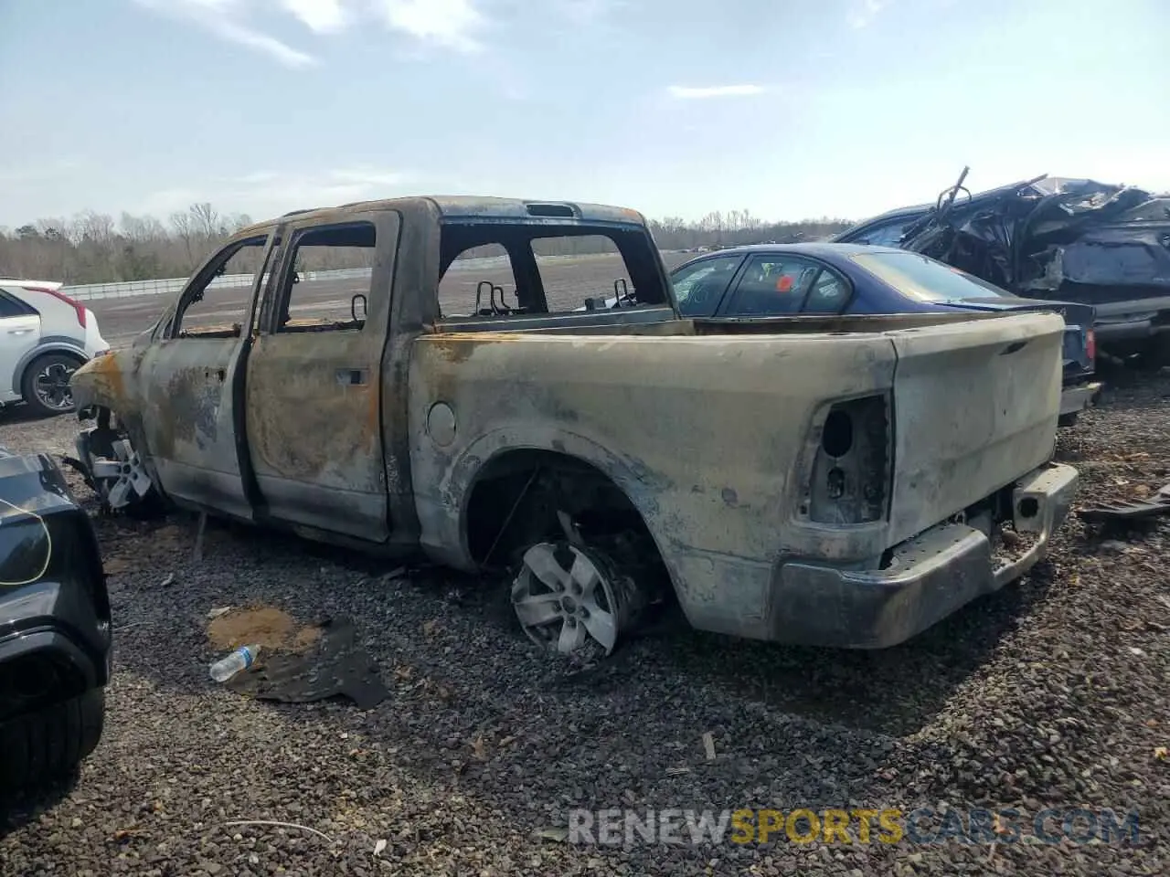 2 Photograph of a damaged car 1C6RR7LG7MS542728 RAM 1500 2021