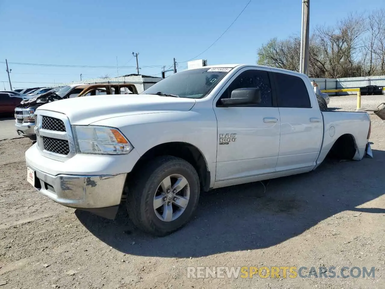 1 Photograph of a damaged car 1C6RR7LGXMS533070 RAM 1500 2021