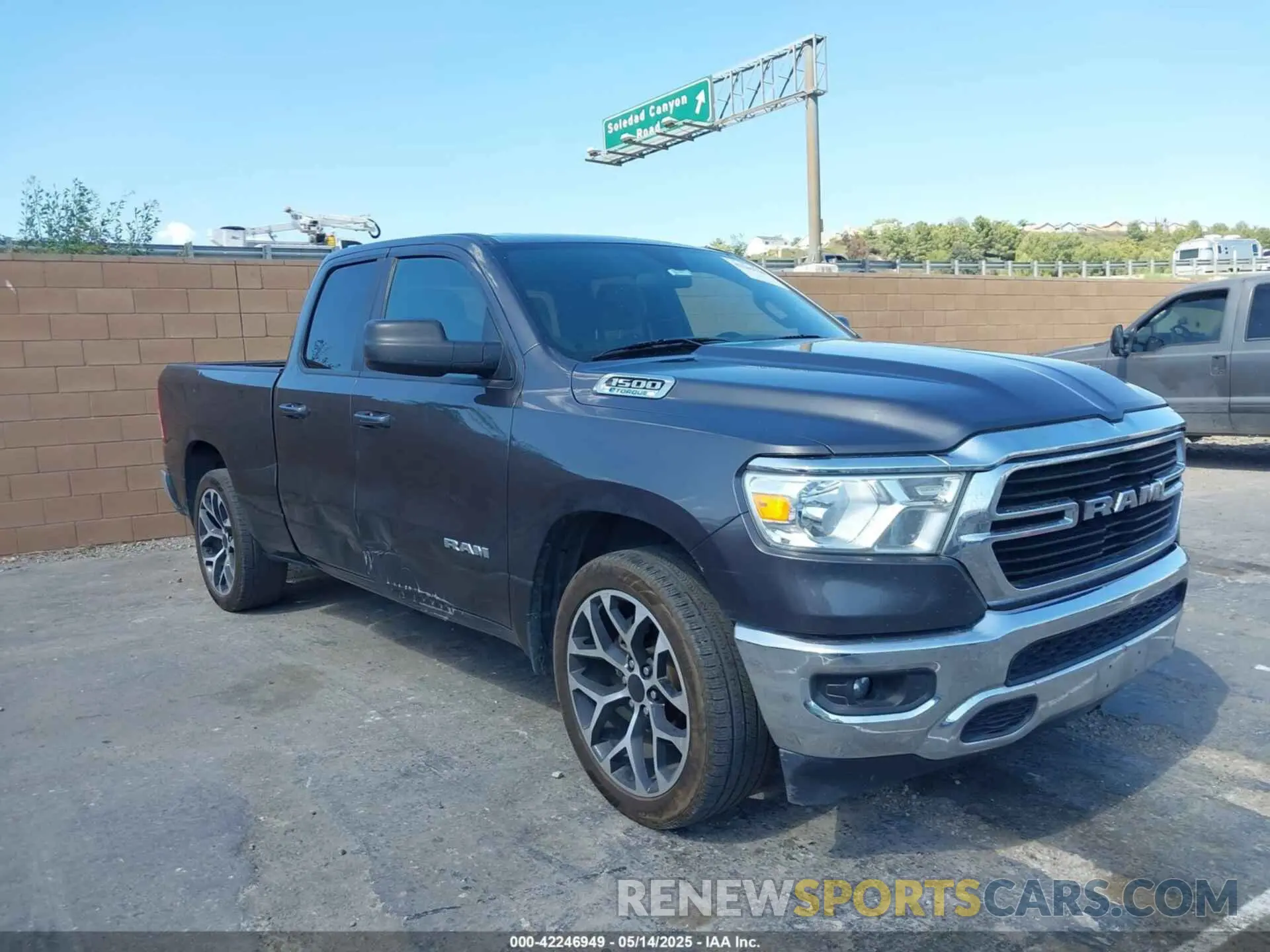 1 Photograph of a damaged car 1C6RREBG3MN743725 RAM 1500 2021