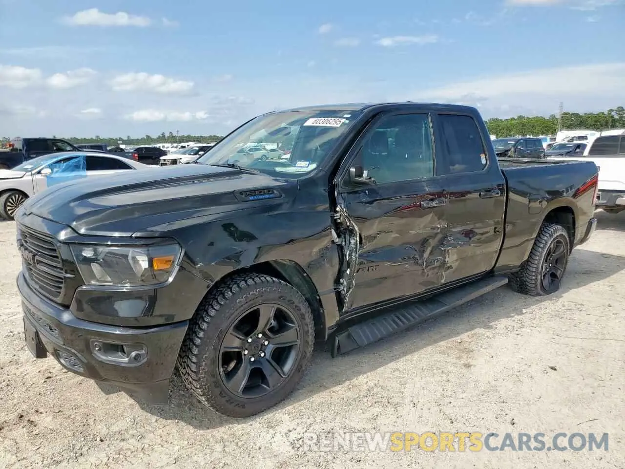 1 Photograph of a damaged car 1C6RREBG7MN820922 RAM 1500 2021