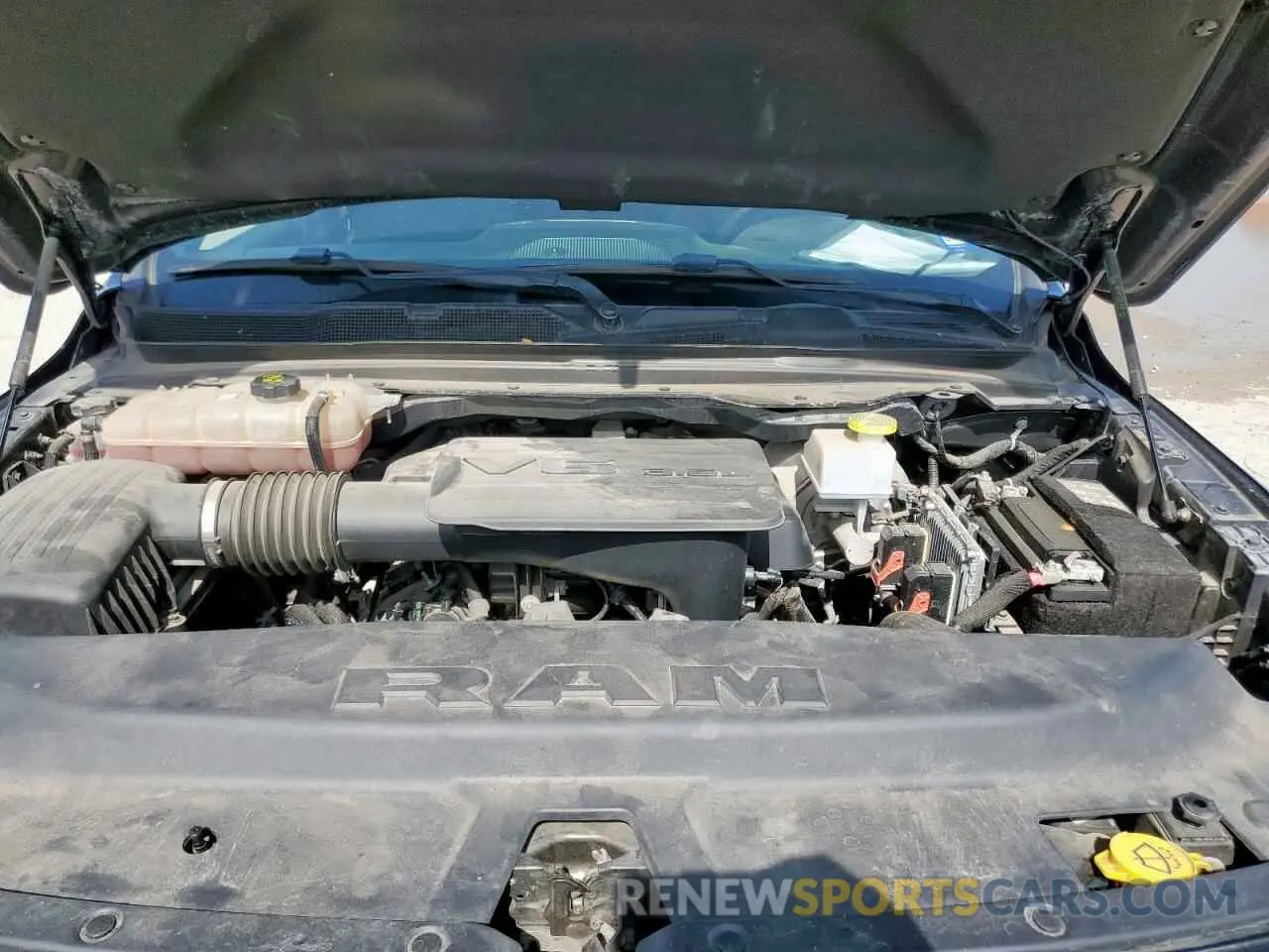 11 Photograph of a damaged car 1C6RREBG7MN820922 RAM 1500 2021