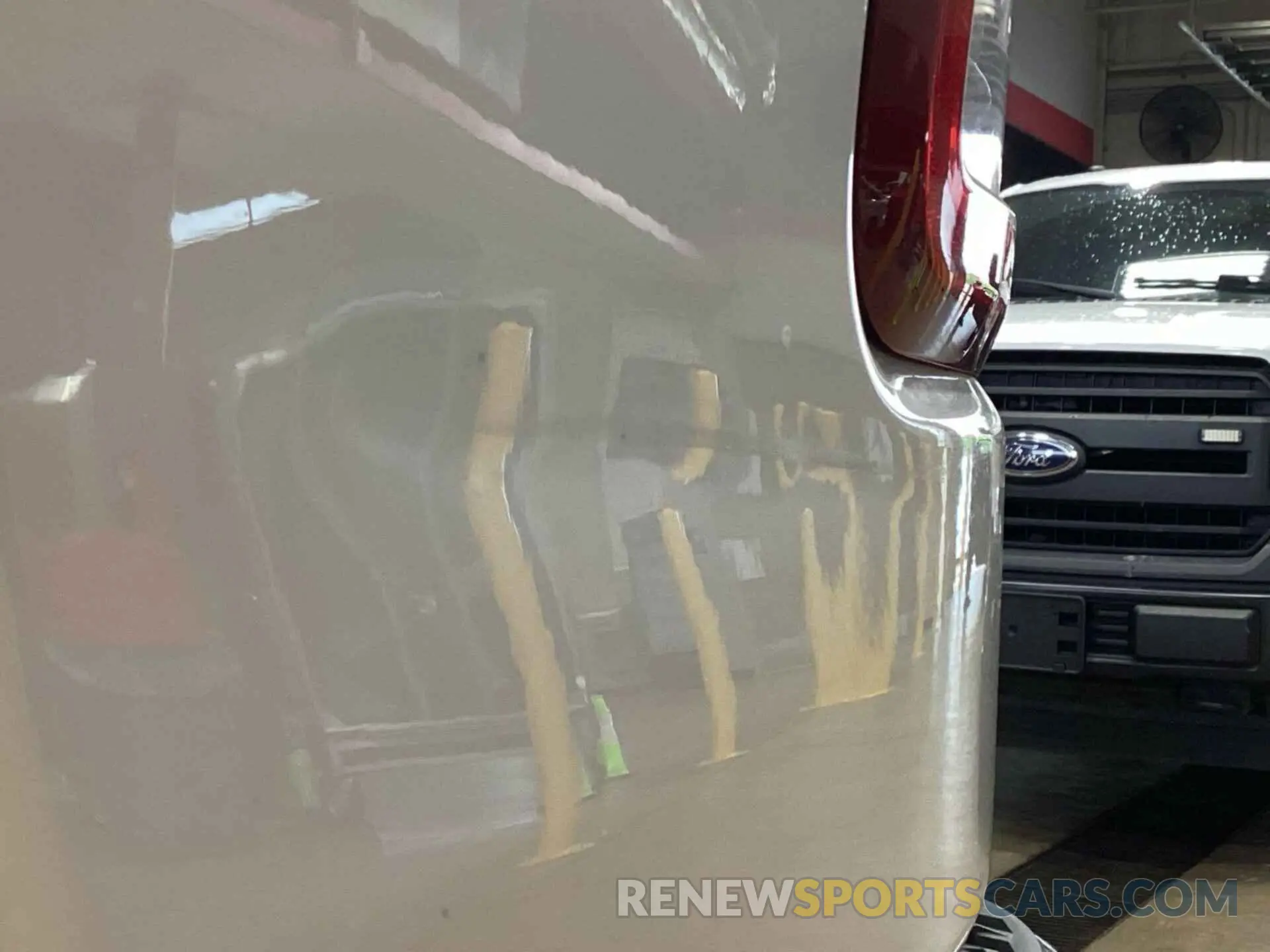 6 Photograph of a damaged car 1C6RREBT0MN533287 RAM 1500 2021