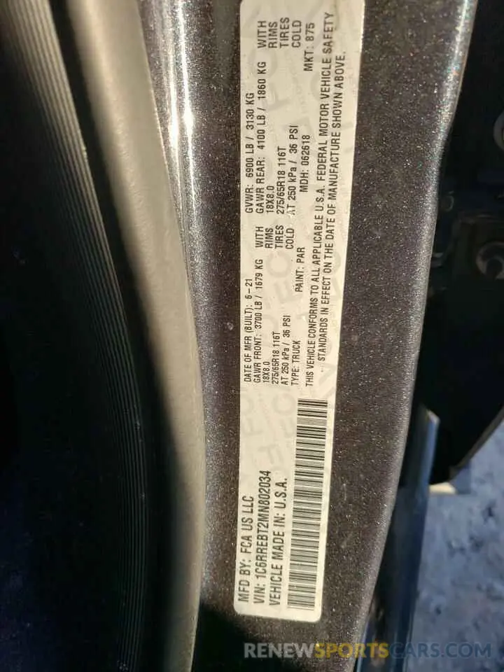 14 Photograph of a damaged car 1C6RREBT2MN802034 RAM 1500 2021