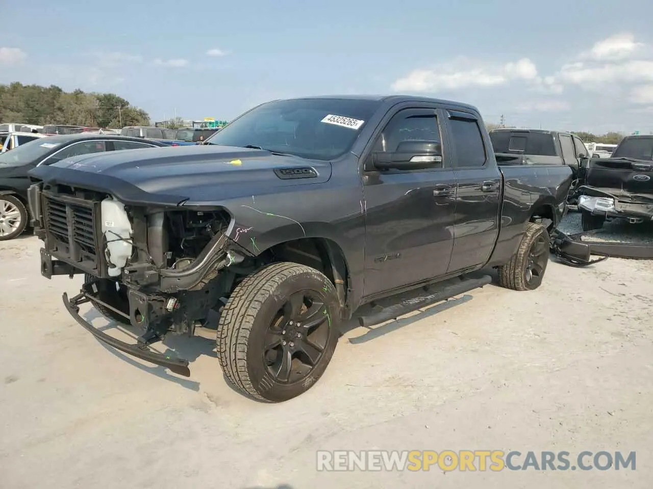 1 Photograph of a damaged car 1C6RREBT3MN594231 RAM 1500 2021