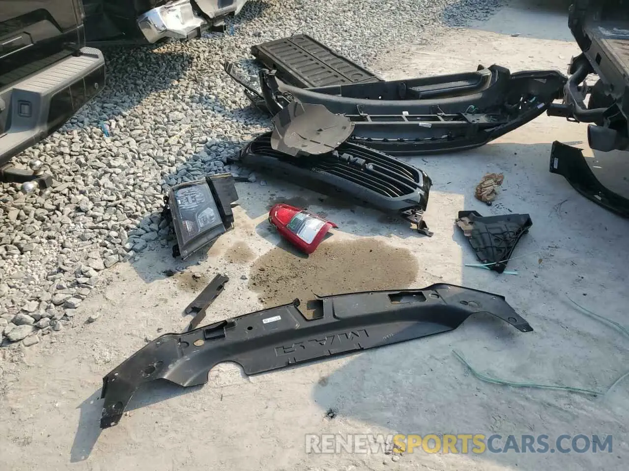 12 Photograph of a damaged car 1C6RREBT3MN594231 RAM 1500 2021