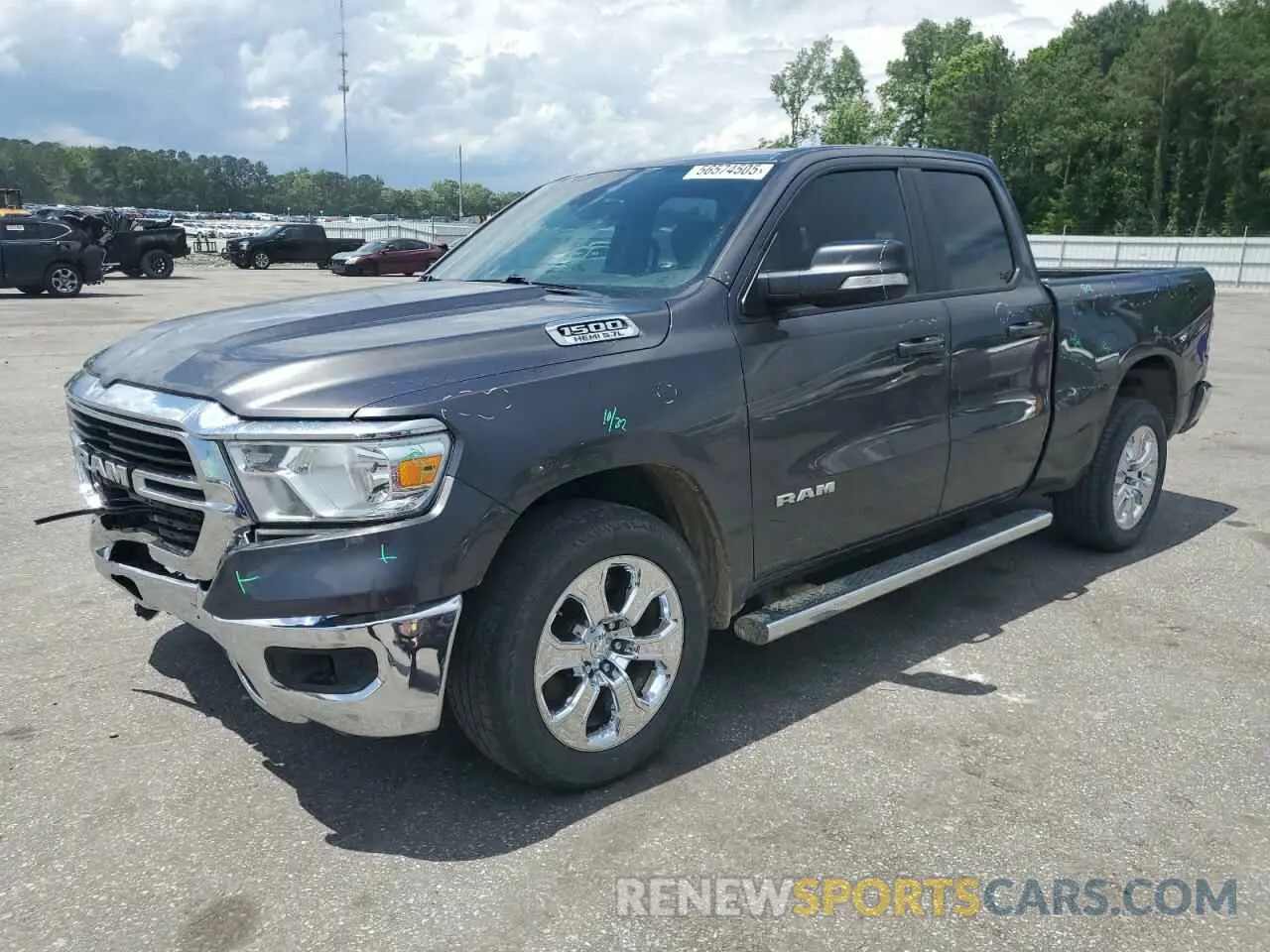 1 Photograph of a damaged car 1C6RREBT4MN811124 RAM 1500 2021
