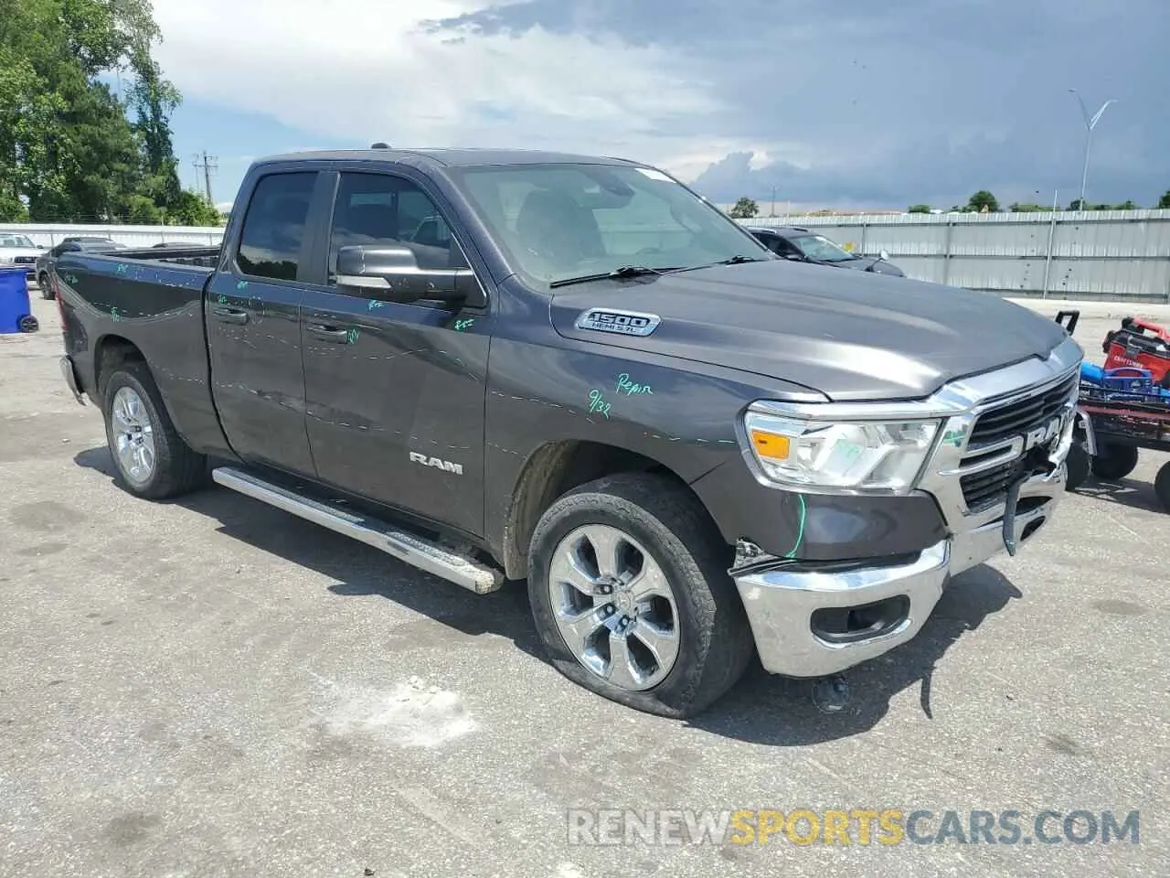 4 Photograph of a damaged car 1C6RREBT4MN811124 RAM 1500 2021
