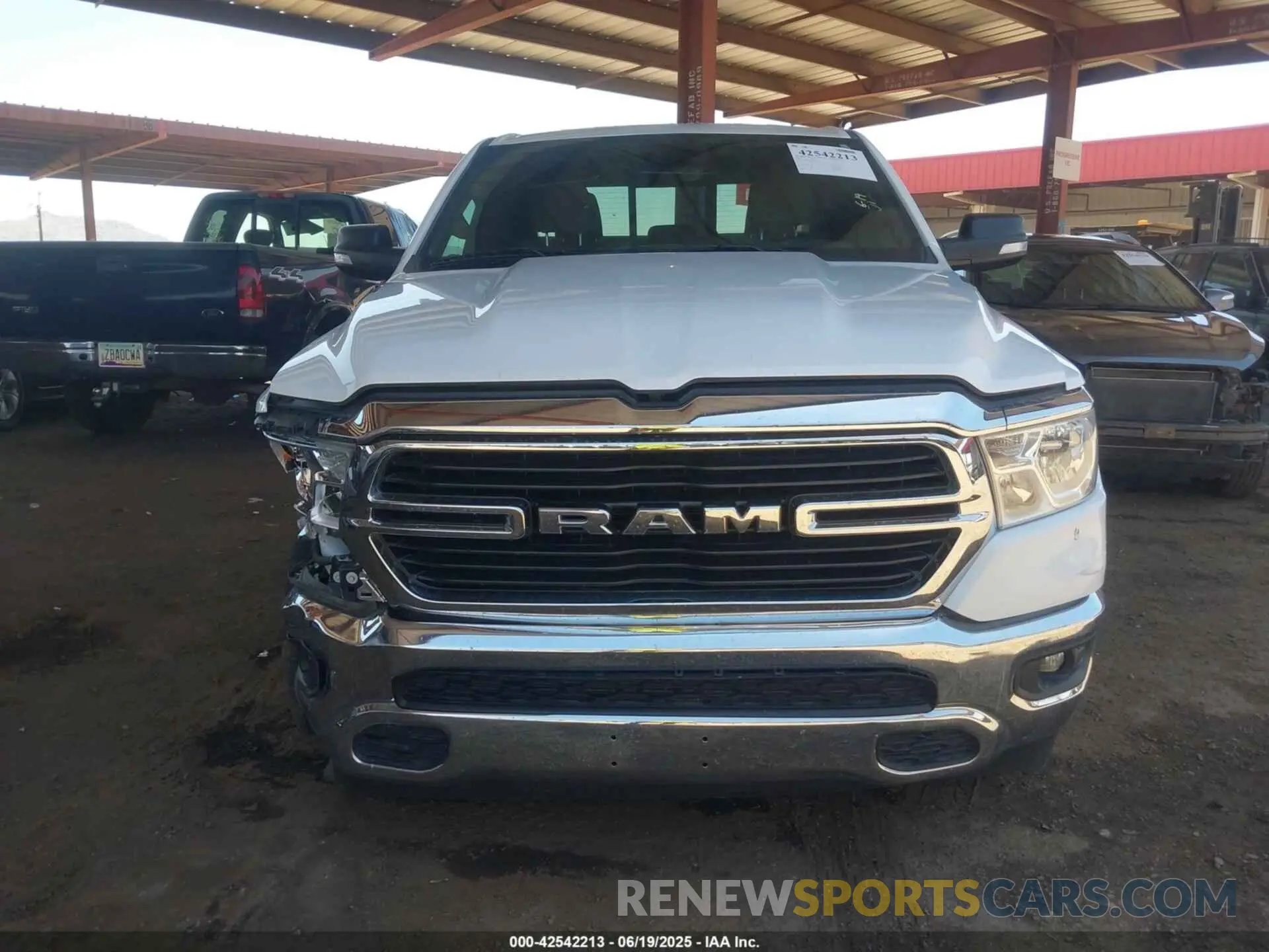 12 Photograph of a damaged car 1C6RREBT6MN530328 RAM 1500 2021