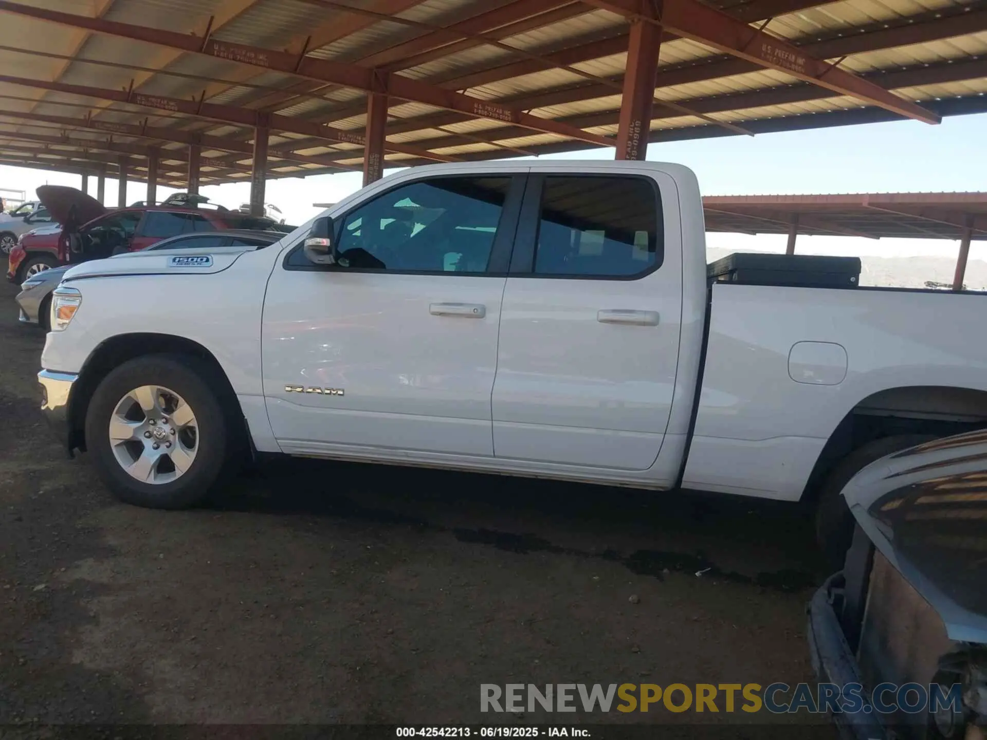 14 Photograph of a damaged car 1C6RREBT6MN530328 RAM 1500 2021