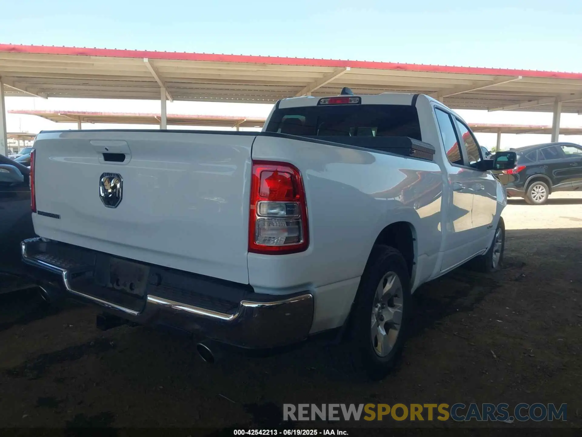 4 Photograph of a damaged car 1C6RREBT6MN530328 RAM 1500 2021