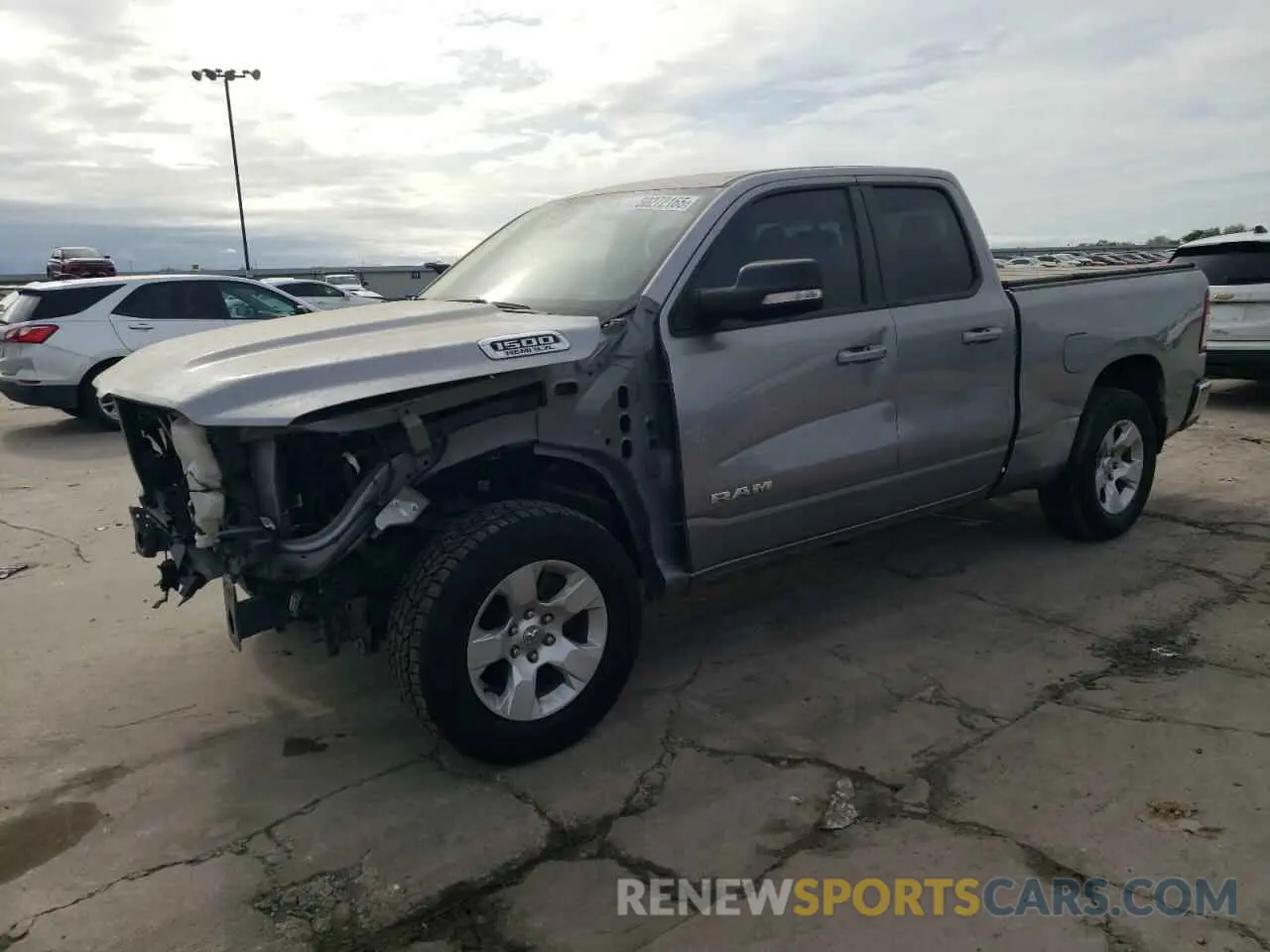1 Photograph of a damaged car 1C6RREBT6MN709694 RAM 1500 2021