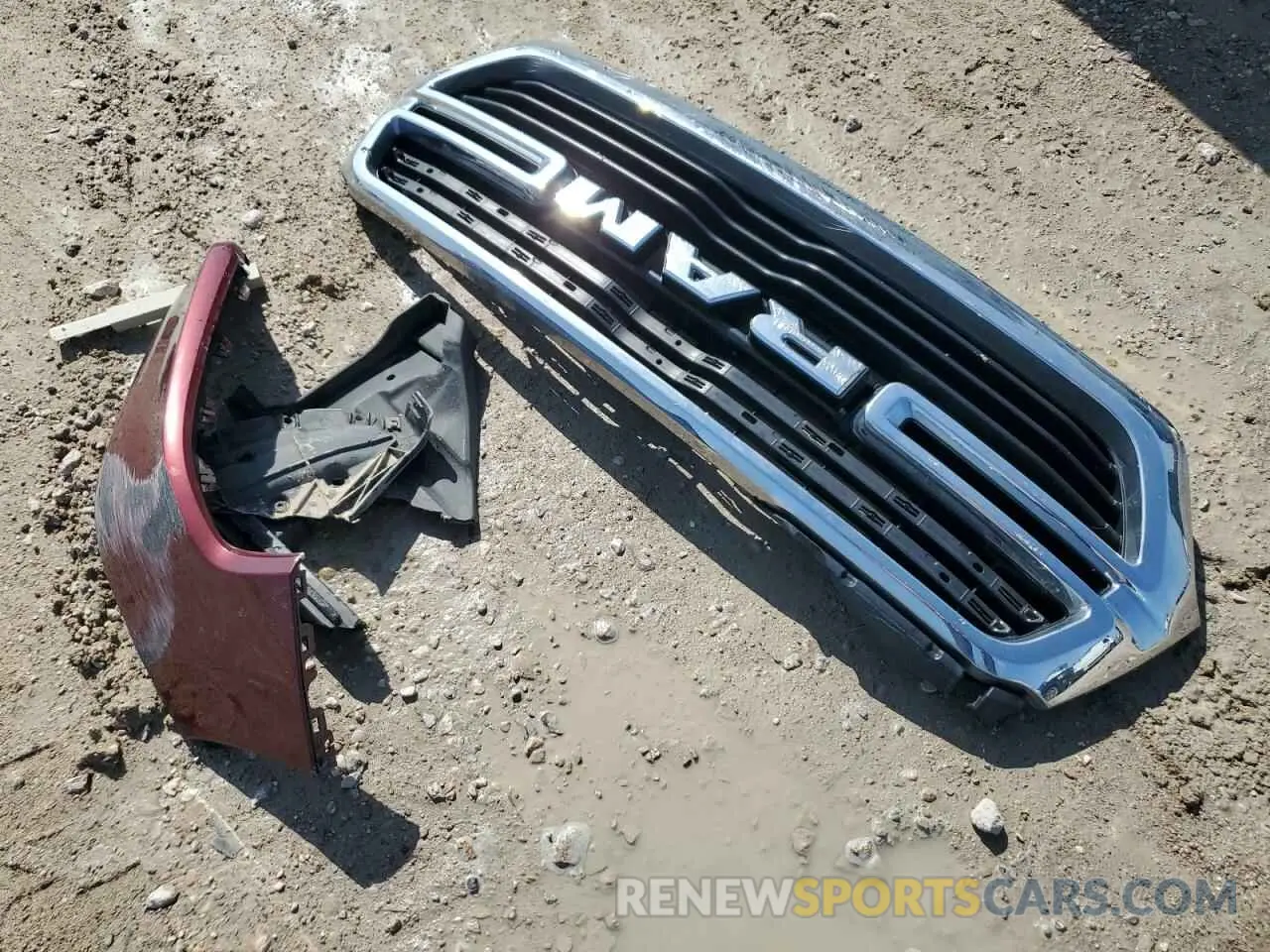 13 Photograph of a damaged car 1C6RREFG1MN593219 RAM 1500 2021
