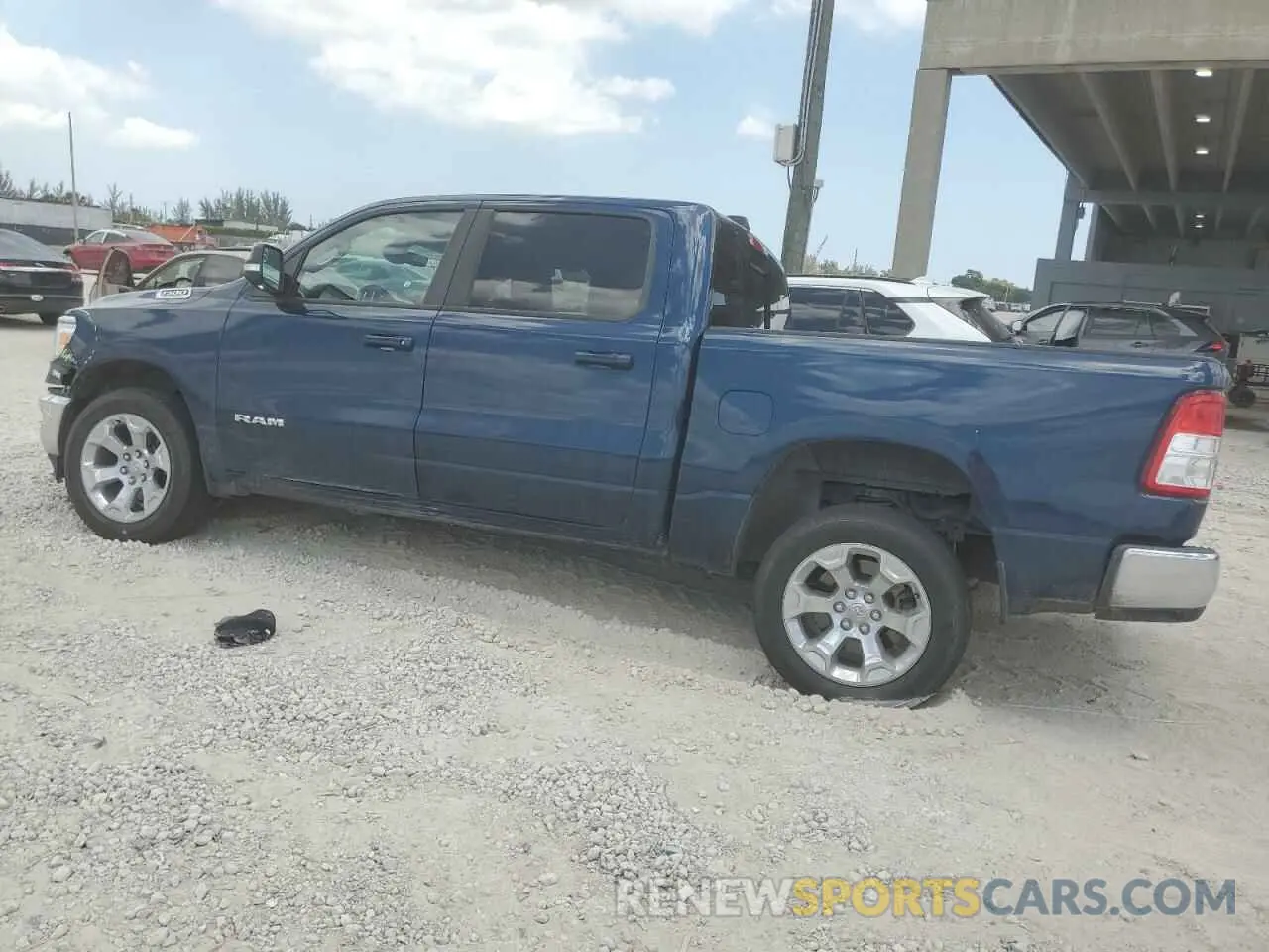 2 Photograph of a damaged car 1C6RREFG5MN801831 RAM 1500 2021