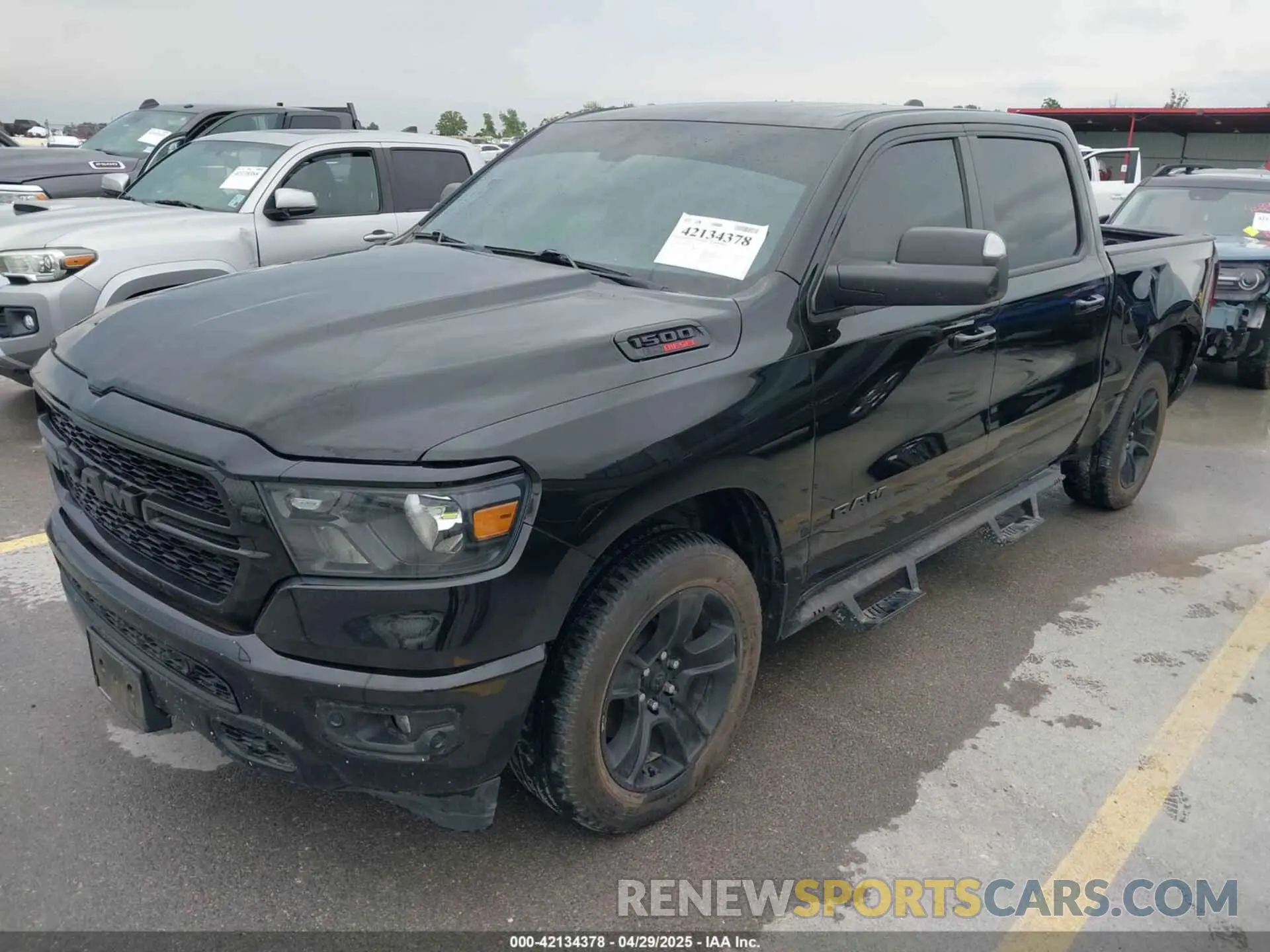 2 Photograph of a damaged car 1C6RREFM3MN835868 RAM 1500 2021