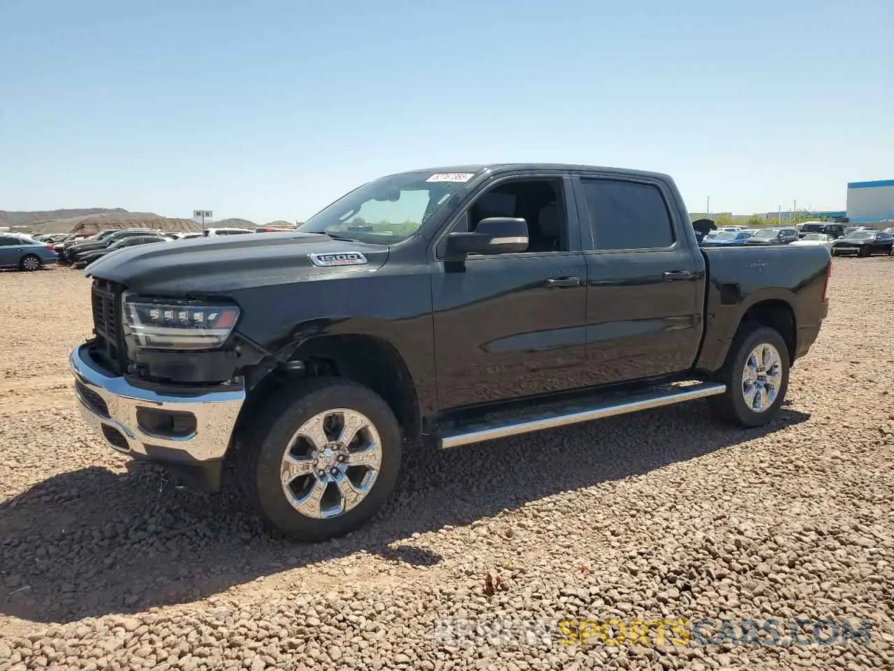 1 Photograph of a damaged car 1C6RREFM7MN712008 RAM 1500 2021