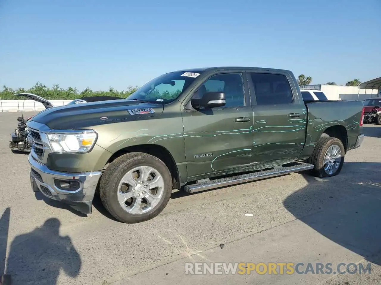 1 Photograph of a damaged car 1C6RREFM8MN630286 RAM 1500 2021