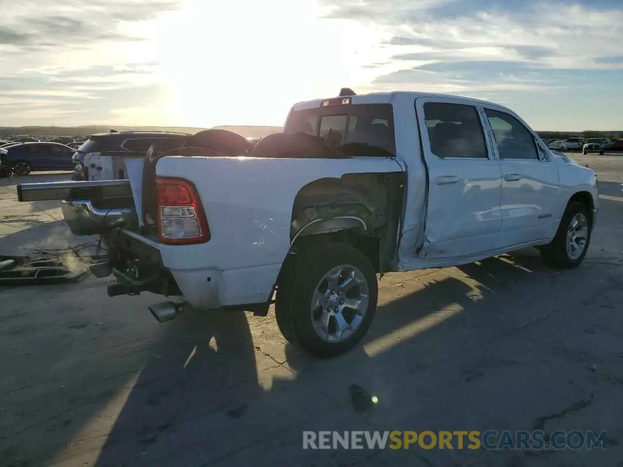 3 Photograph of a damaged car 1C6RREFT0MN661085 RAM 1500 2021