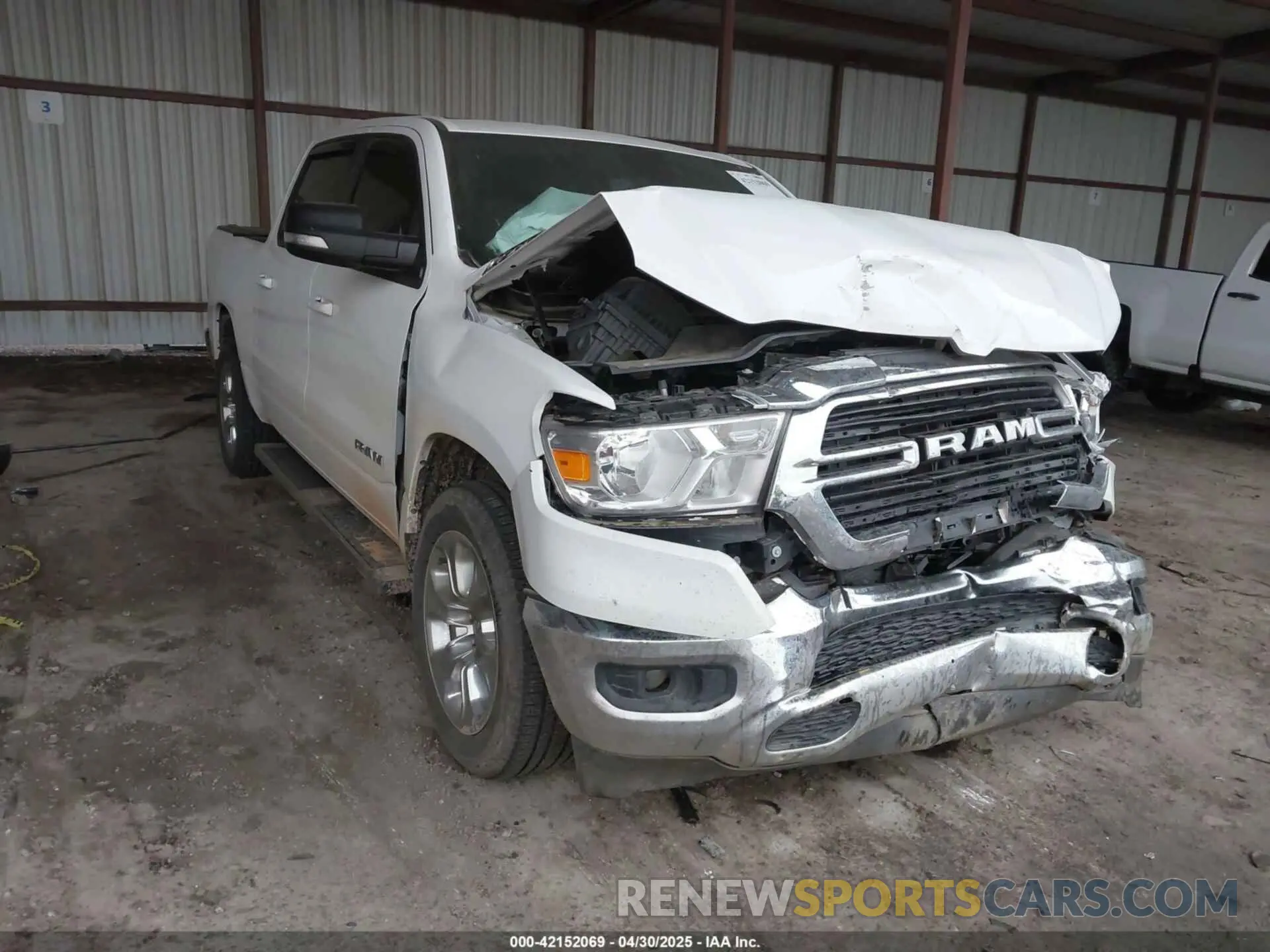 1 Photograph of a damaged car 1C6RREFT1MN646966 RAM 1500 2021