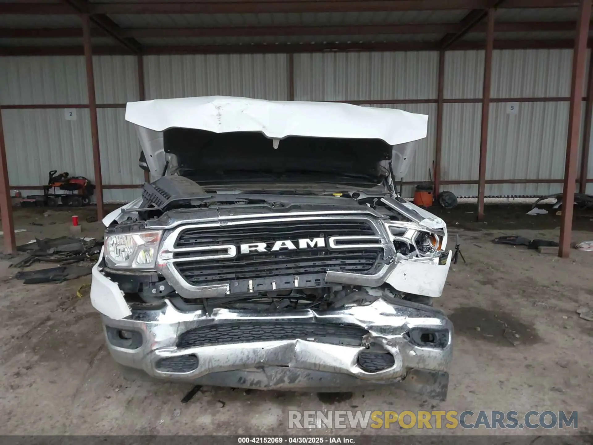 12 Photograph of a damaged car 1C6RREFT1MN646966 RAM 1500 2021