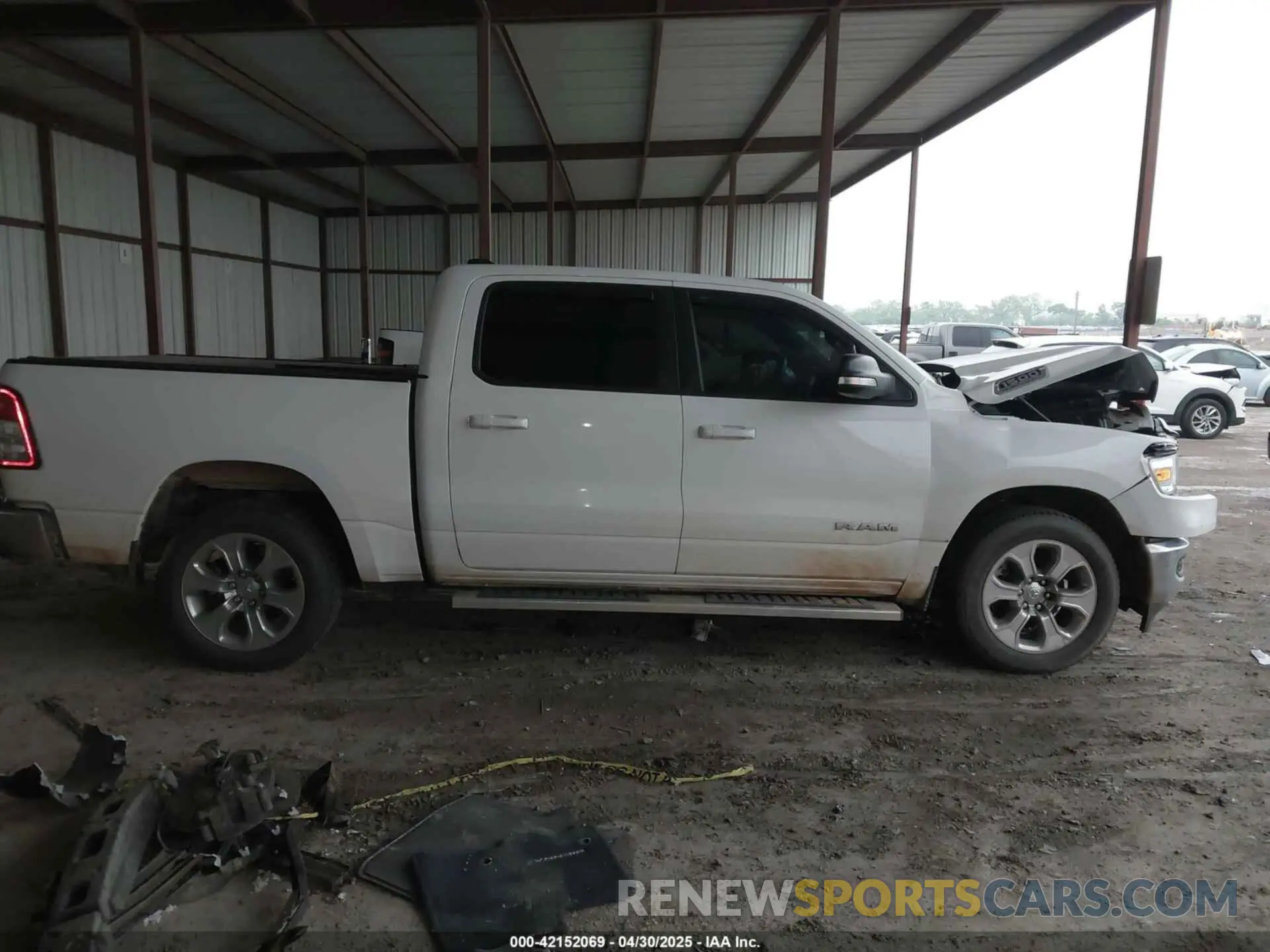 13 Photograph of a damaged car 1C6RREFT1MN646966 RAM 1500 2021