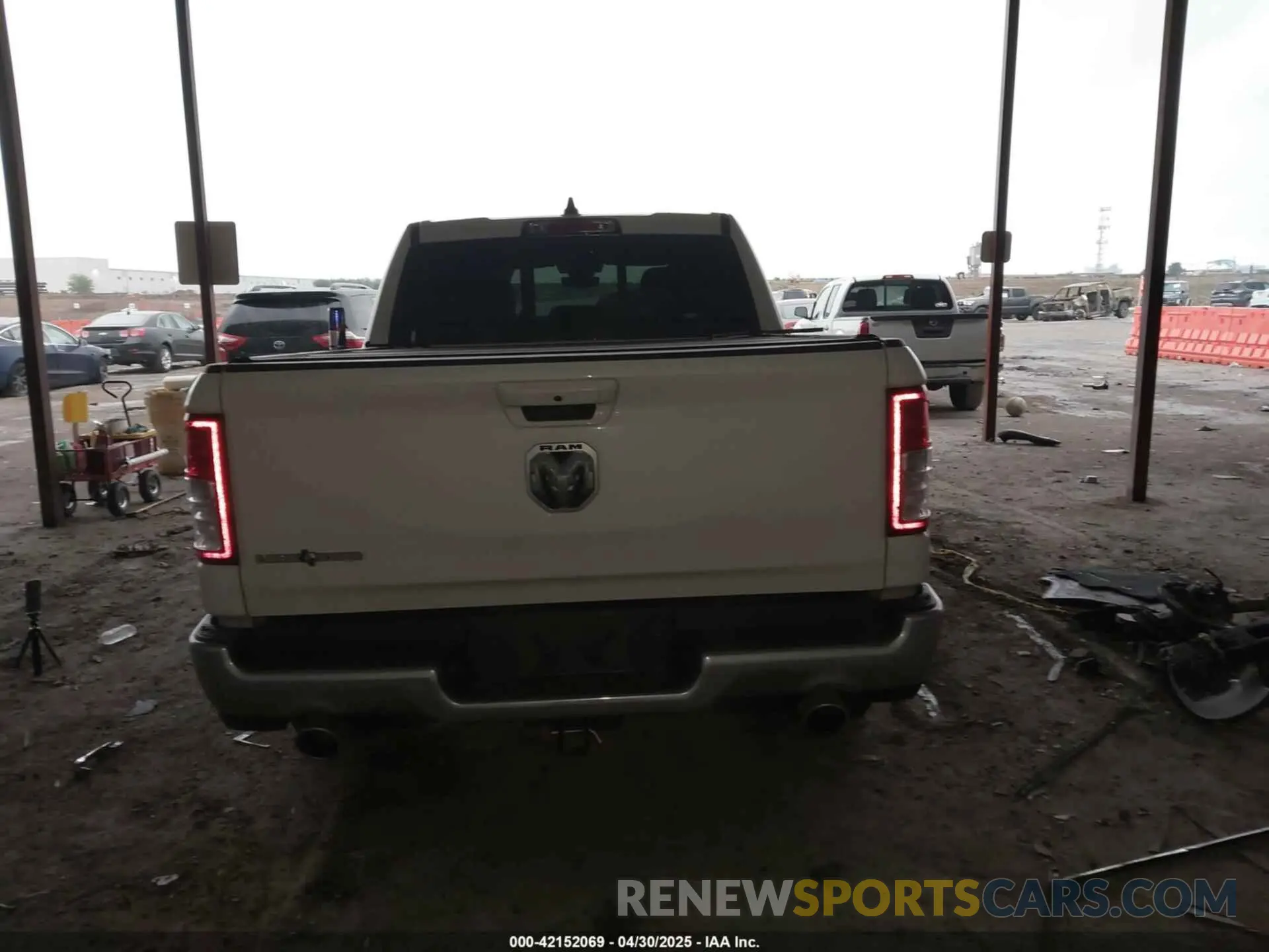16 Photograph of a damaged car 1C6RREFT1MN646966 RAM 1500 2021
