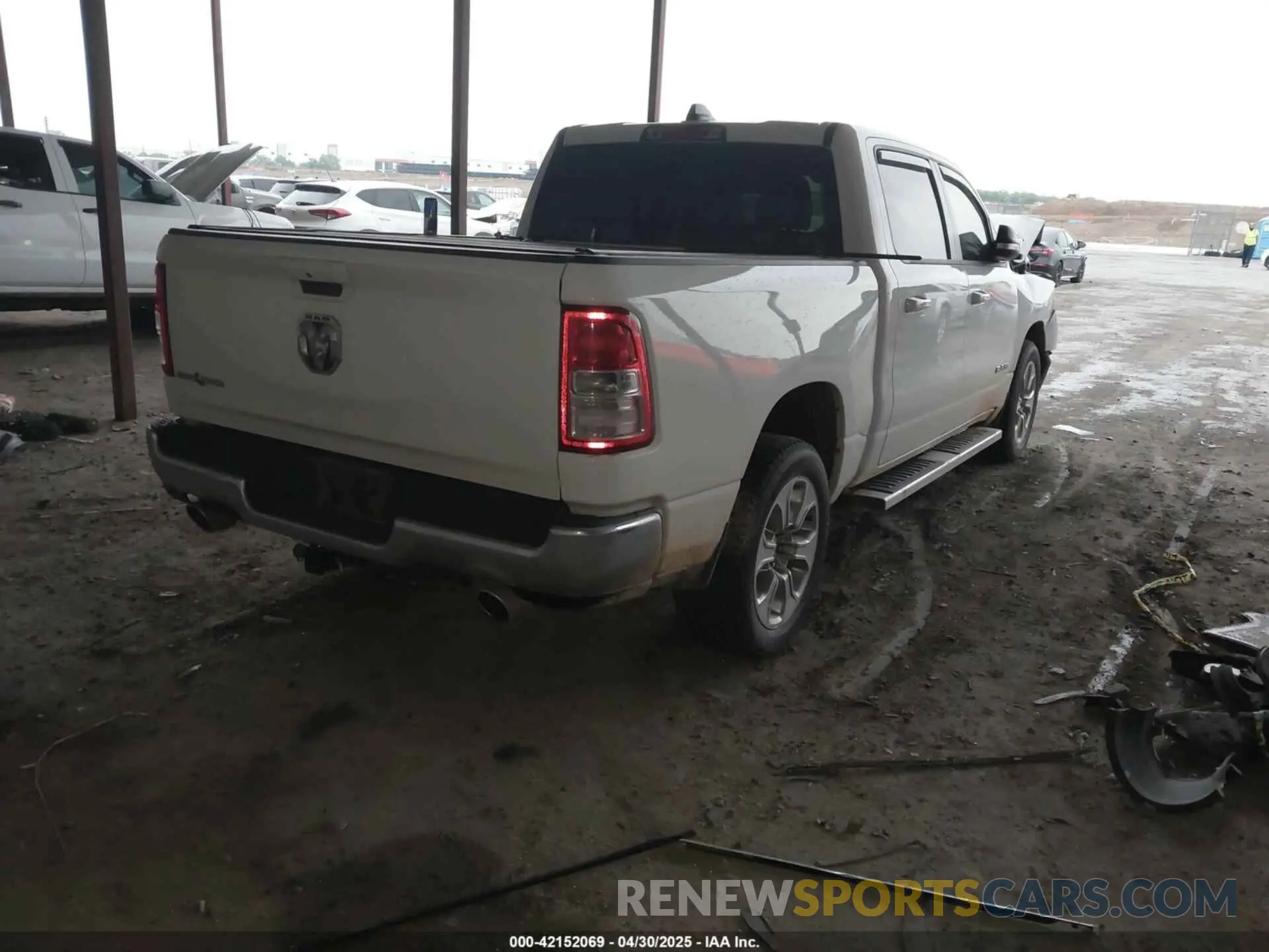 4 Photograph of a damaged car 1C6RREFT1MN646966 RAM 1500 2021