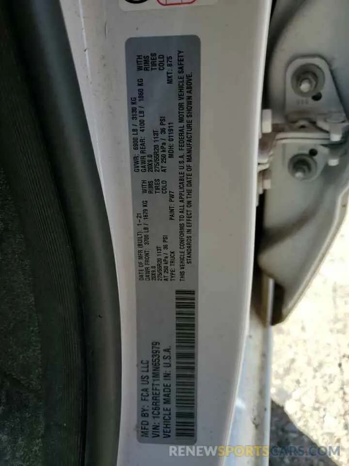 14 Photograph of a damaged car 1C6RREFT1MN653979 RAM 1500 2021