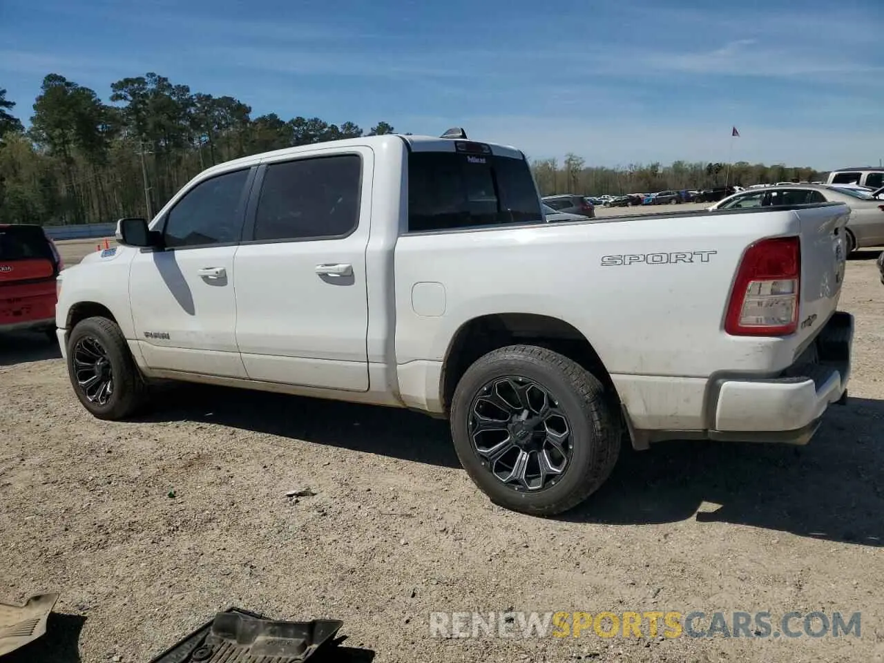 2 Photograph of a damaged car 1C6RREFT1MN653979 RAM 1500 2021