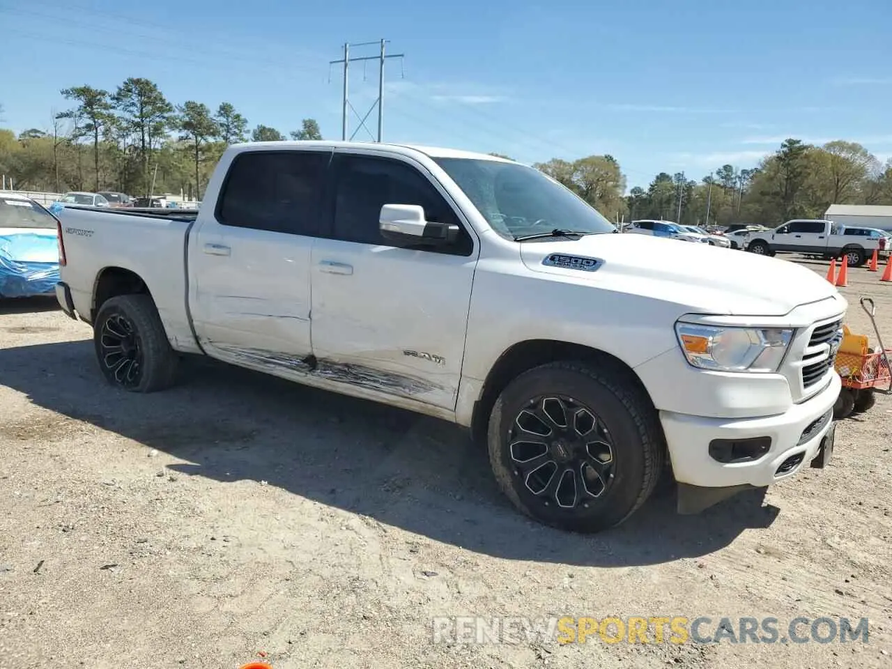 4 Photograph of a damaged car 1C6RREFT1MN653979 RAM 1500 2021