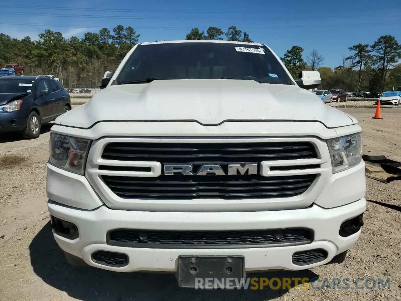 5 Photograph of a damaged car 1C6RREFT1MN653979 RAM 1500 2021