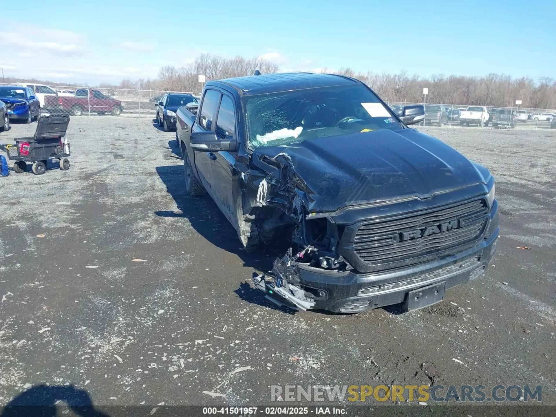 1 Photograph of a damaged car 1C6RREFT1MN690725 RAM 1500 2021