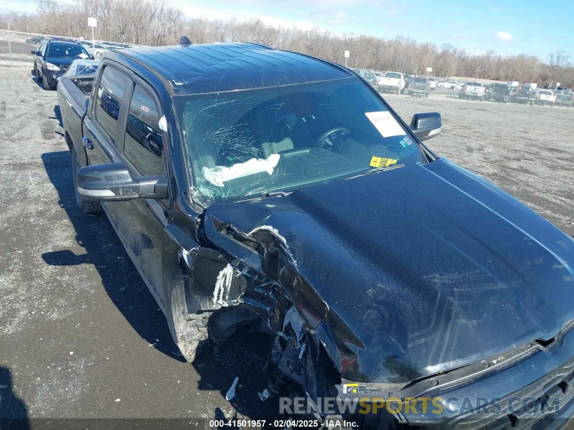19 Photograph of a damaged car 1C6RREFT1MN690725 RAM 1500 2021