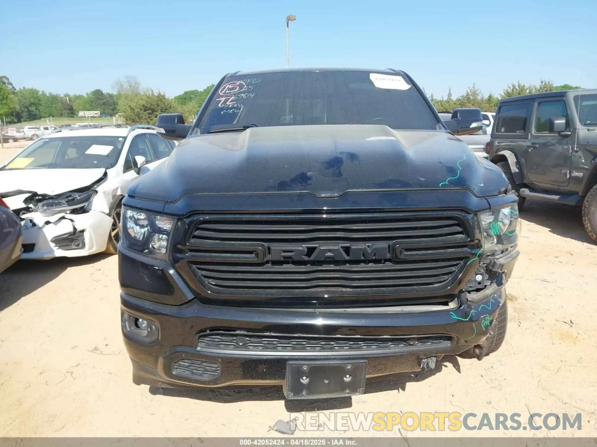 12 Photograph of a damaged car 1C6RREFT1MN769814 RAM 1500 2021