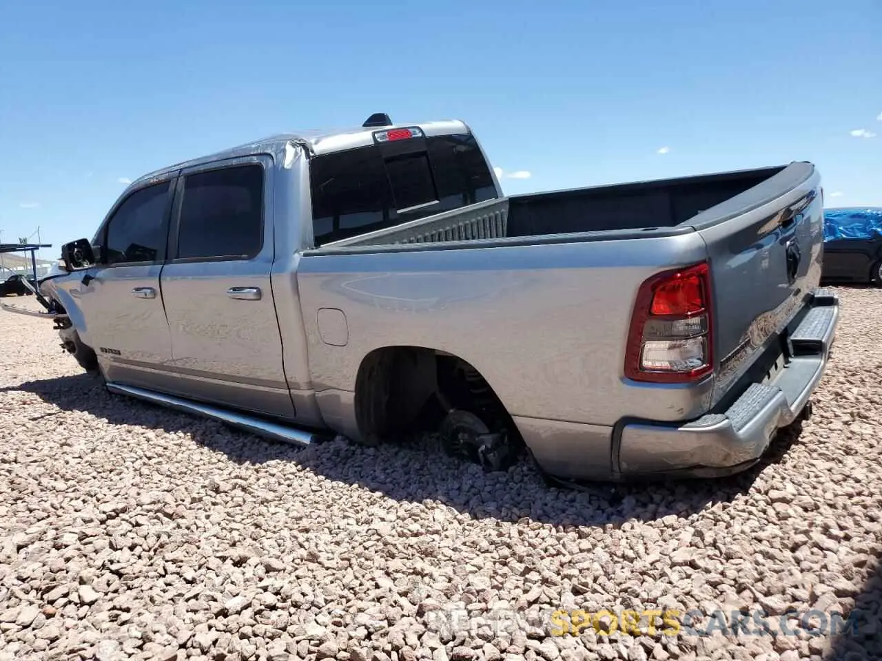 2 Photograph of a damaged car 1C6RREFT2MN590066 RAM 1500 2021
