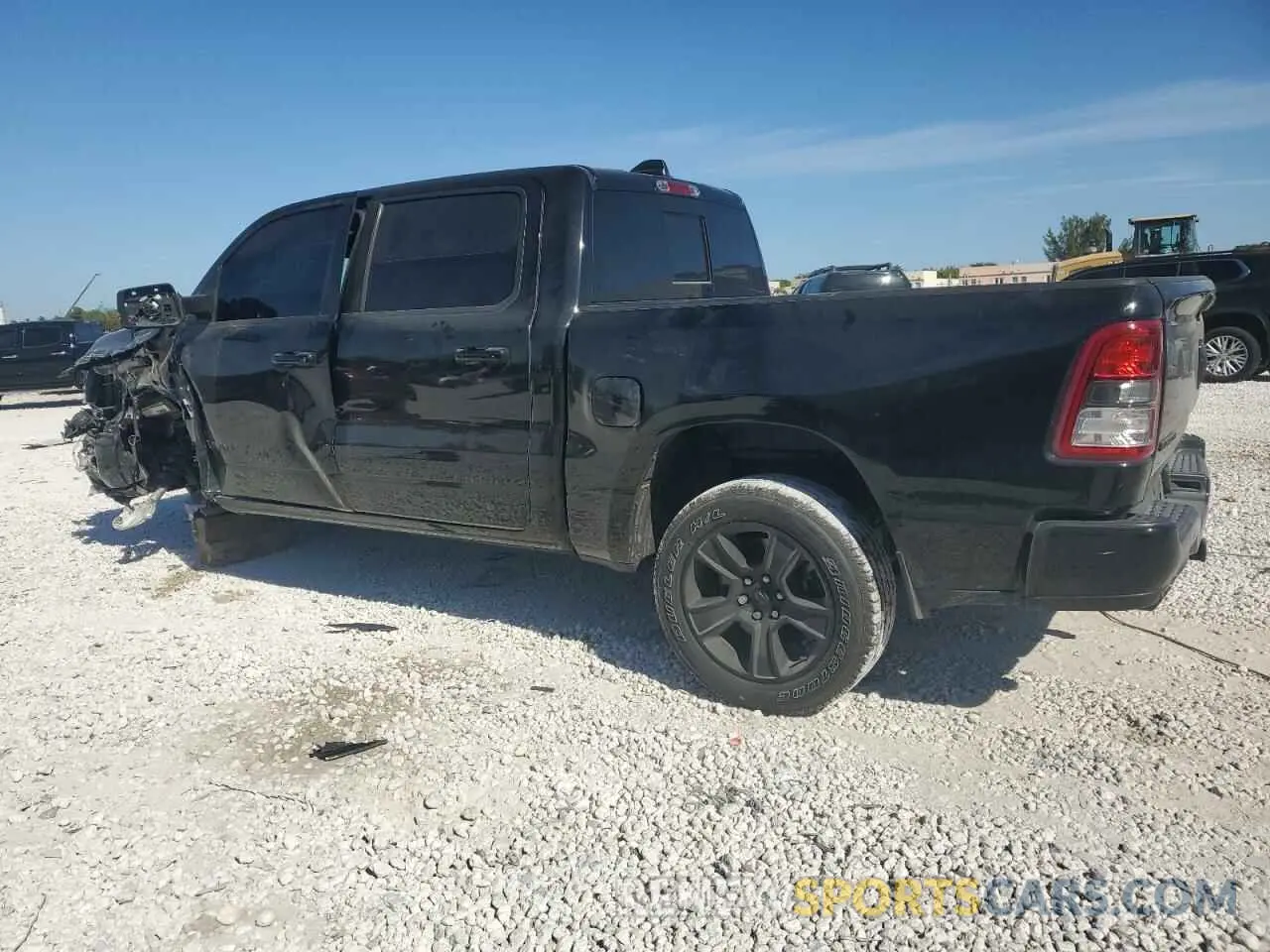 2 Photograph of a damaged car 1C6RREFT2MN660620 RAM 1500 2021