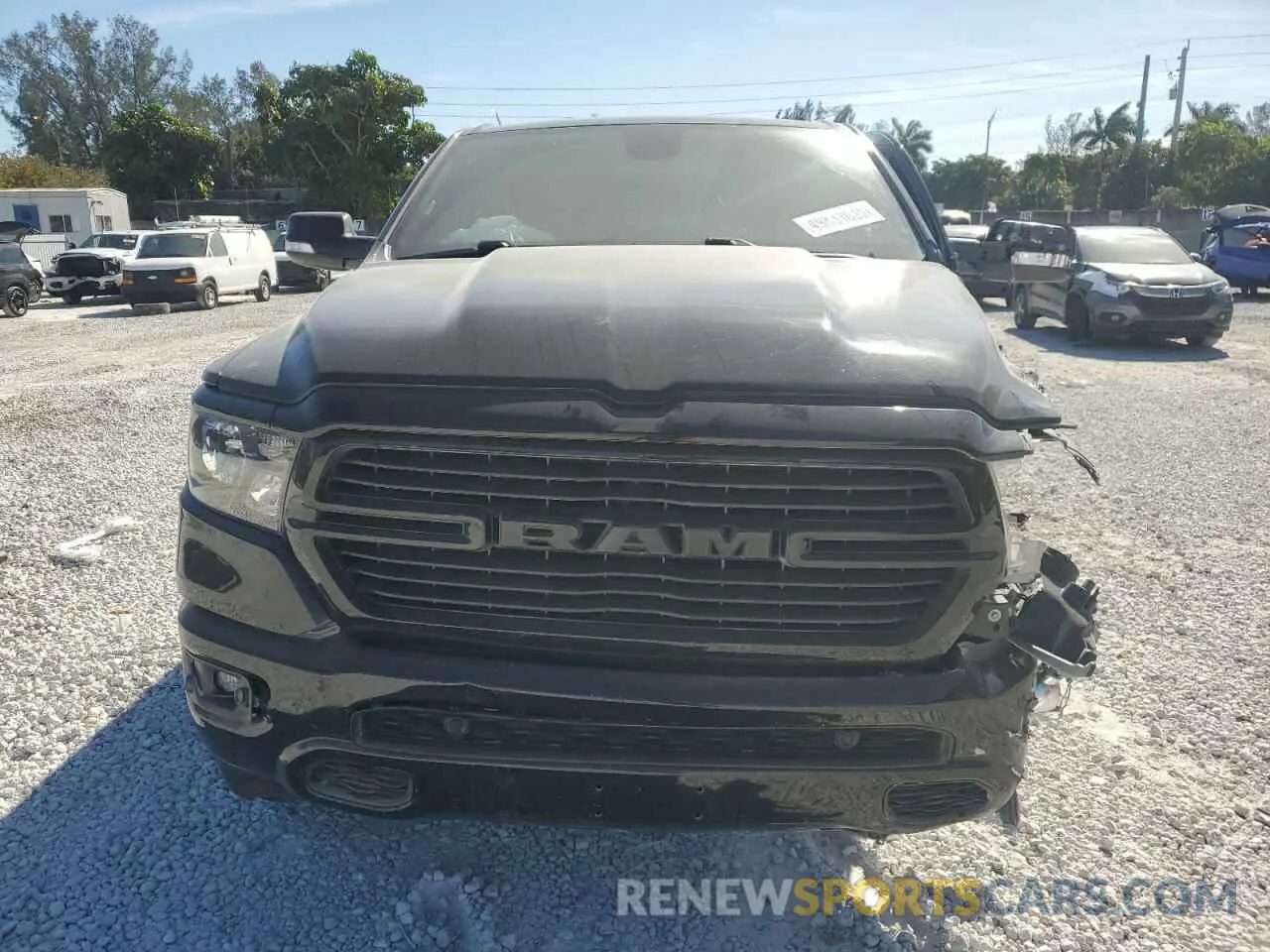 5 Photograph of a damaged car 1C6RREFT2MN660620 RAM 1500 2021