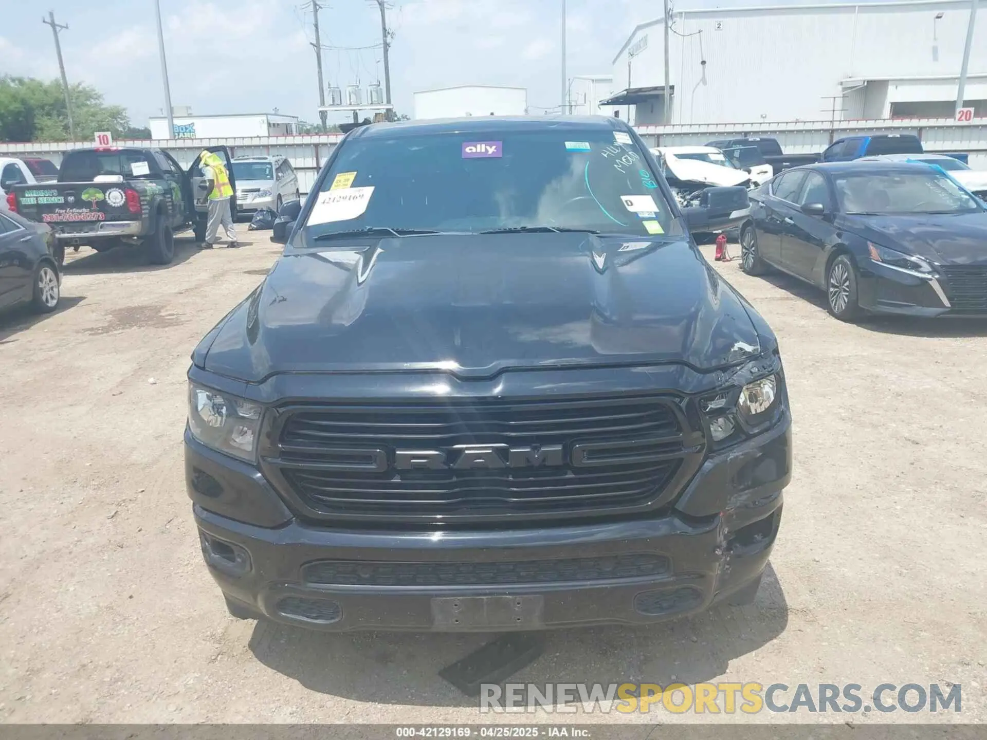 12 Photograph of a damaged car 1C6RREFT3MN647245 RAM 1500 2021