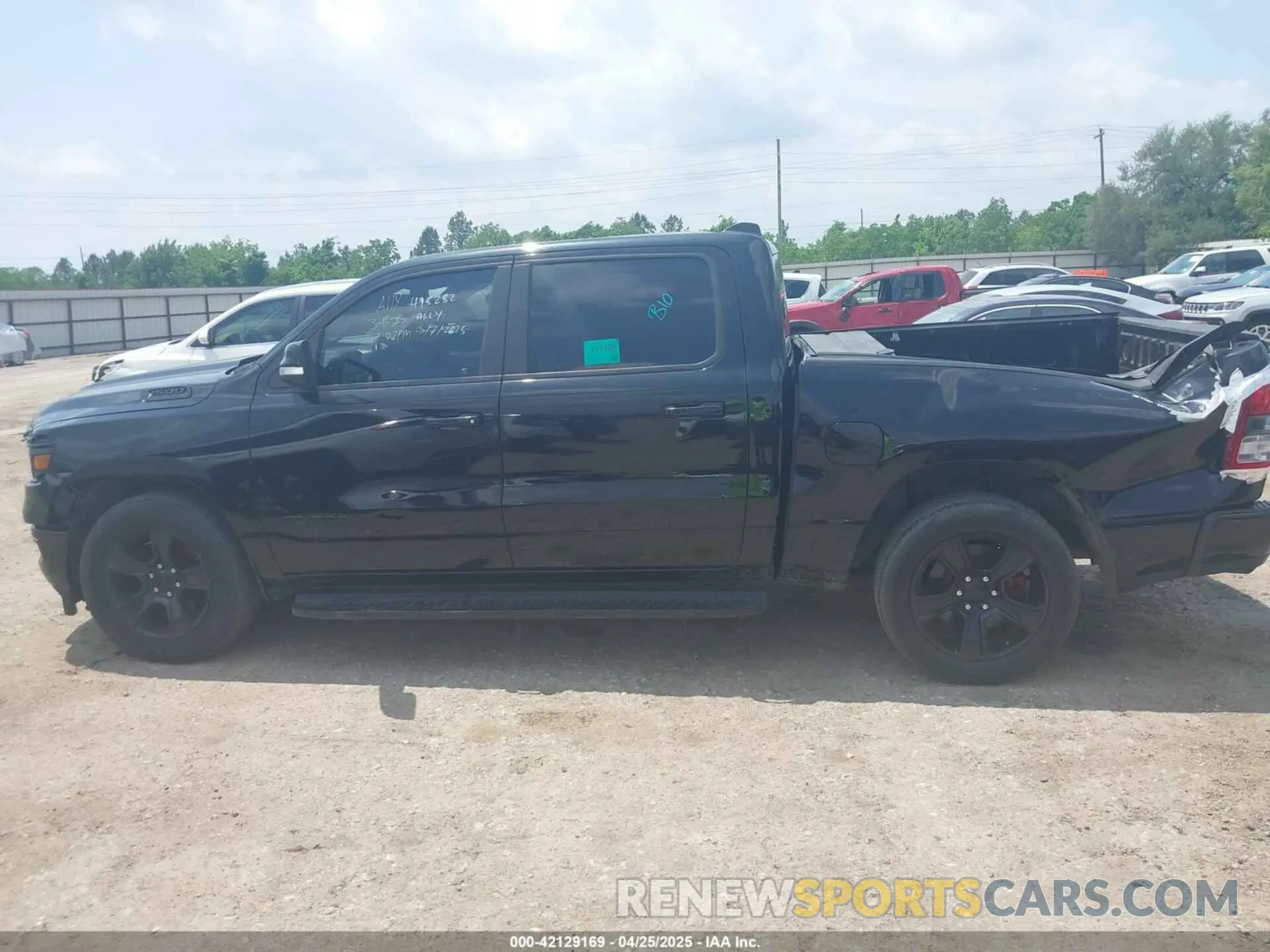 14 Photograph of a damaged car 1C6RREFT3MN647245 RAM 1500 2021