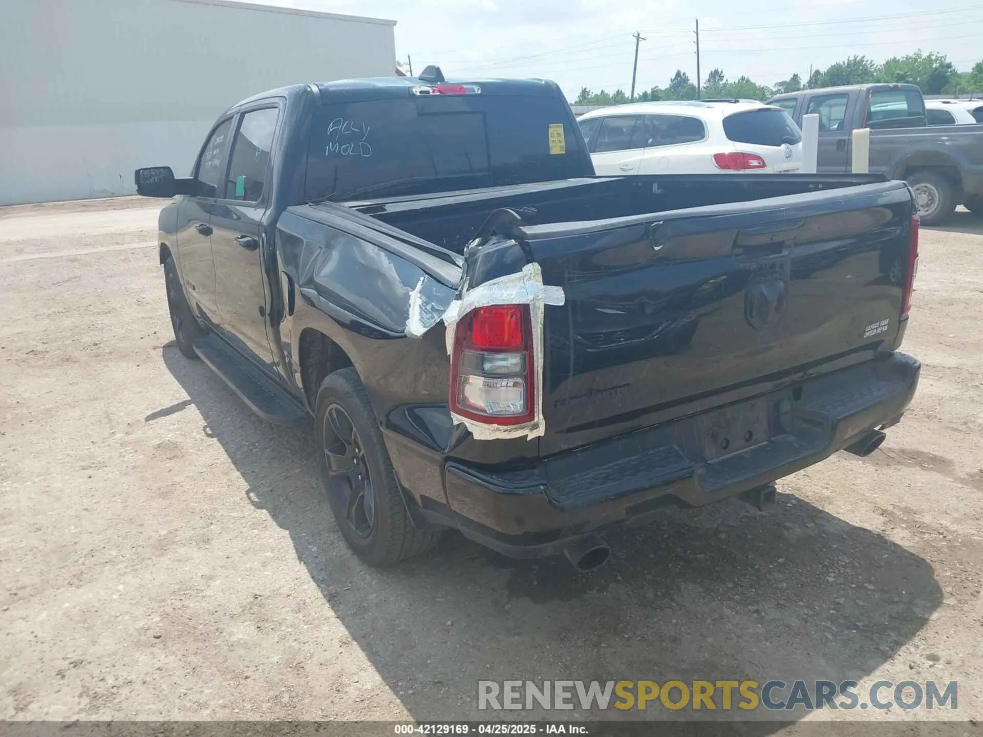 3 Photograph of a damaged car 1C6RREFT3MN647245 RAM 1500 2021