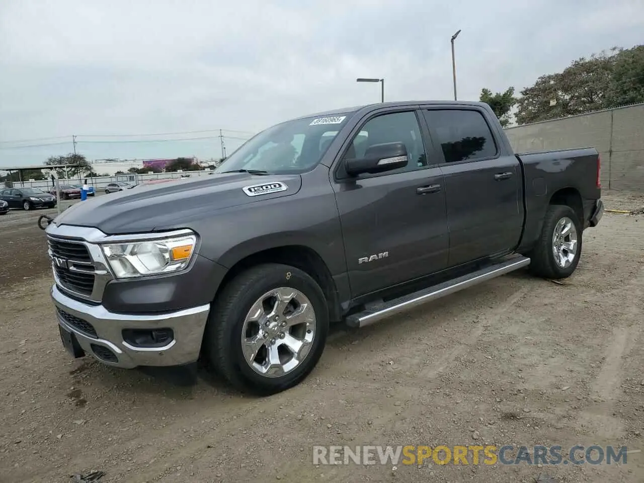 1 Photograph of a damaged car 1C6RREFT4MN631569 RAM 1500 2021