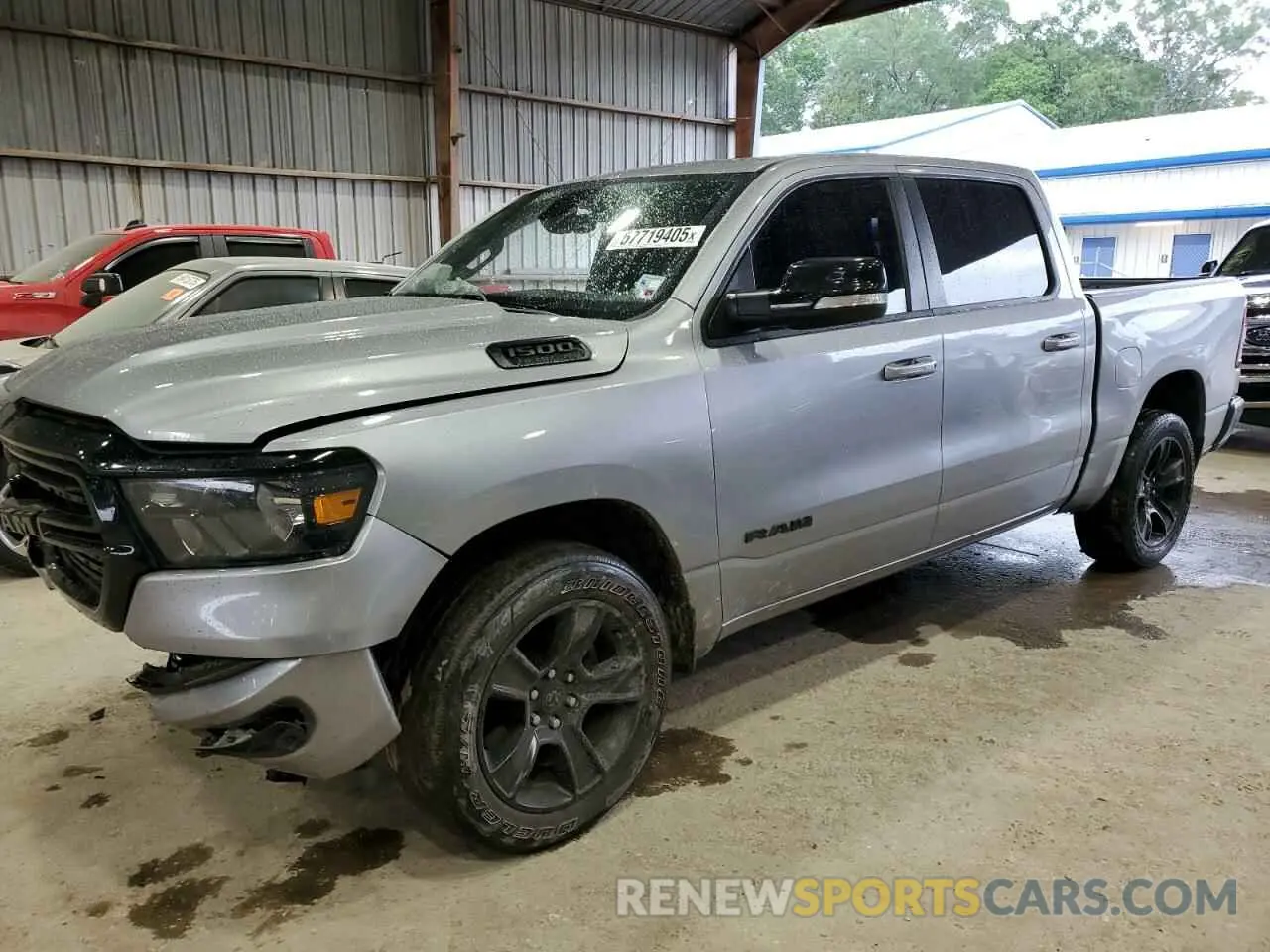 1 Photograph of a damaged car 1C6RREFT7MN708516 RAM 1500 2021