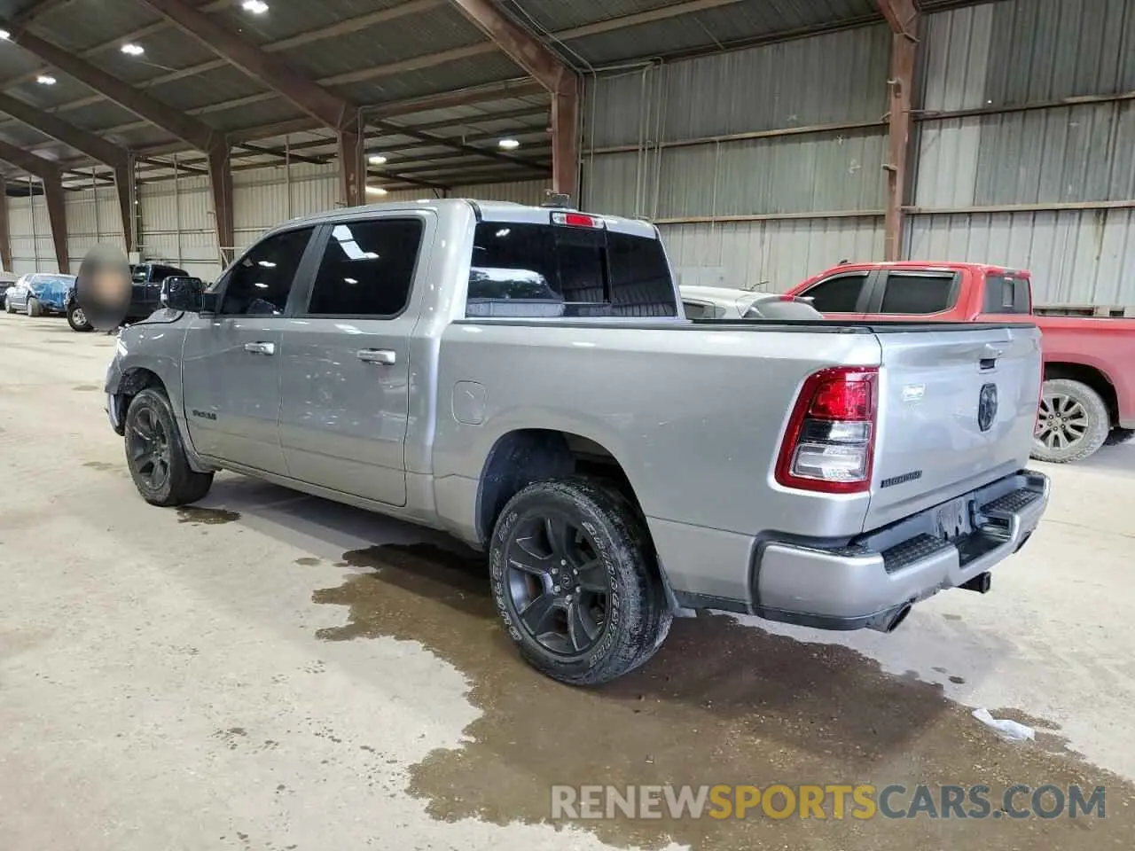2 Photograph of a damaged car 1C6RREFT7MN708516 RAM 1500 2021